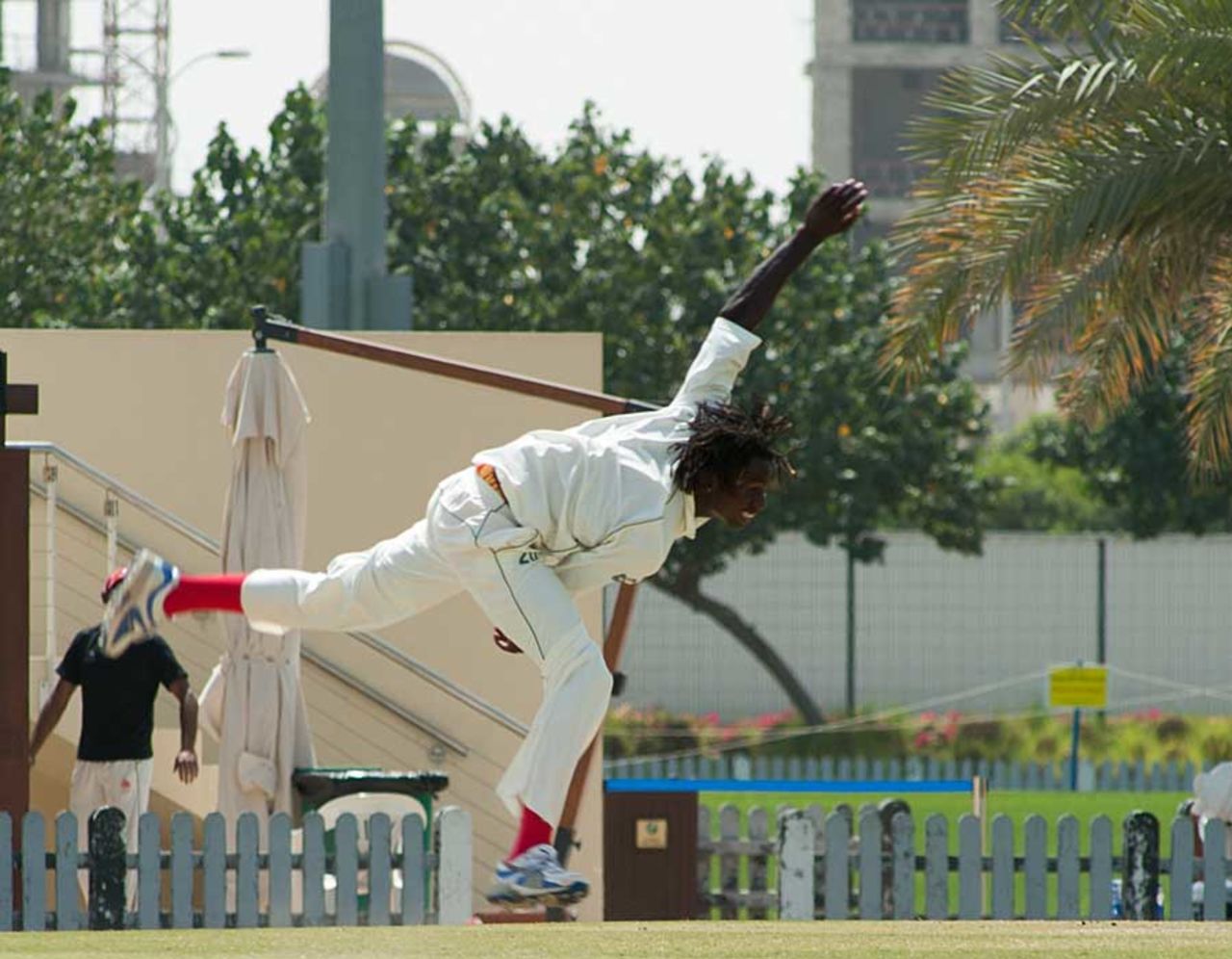 Nelson Odhiambo completes his action, Canada v Kenya, ICC Intercontinental Cup, Sharjah, 1st day, March 18, 2013