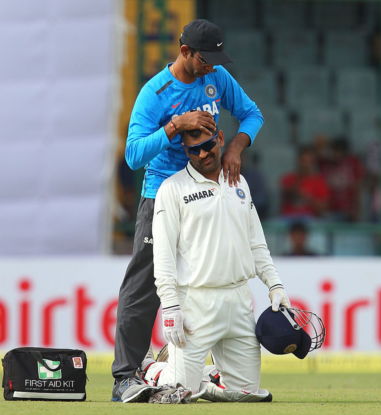 MS Dhoni receives a head massage between overs, India v Australia, 4th Test, Delhi, March 22, 2013