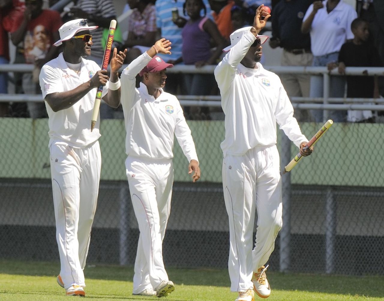 Darren Sammy, Shivnarine Chanderpaul and Shane Shillingford walk around the ground, West Indies v Zimbabwe, 2nd Test, Dominica, 3rd day, March 22, 2013