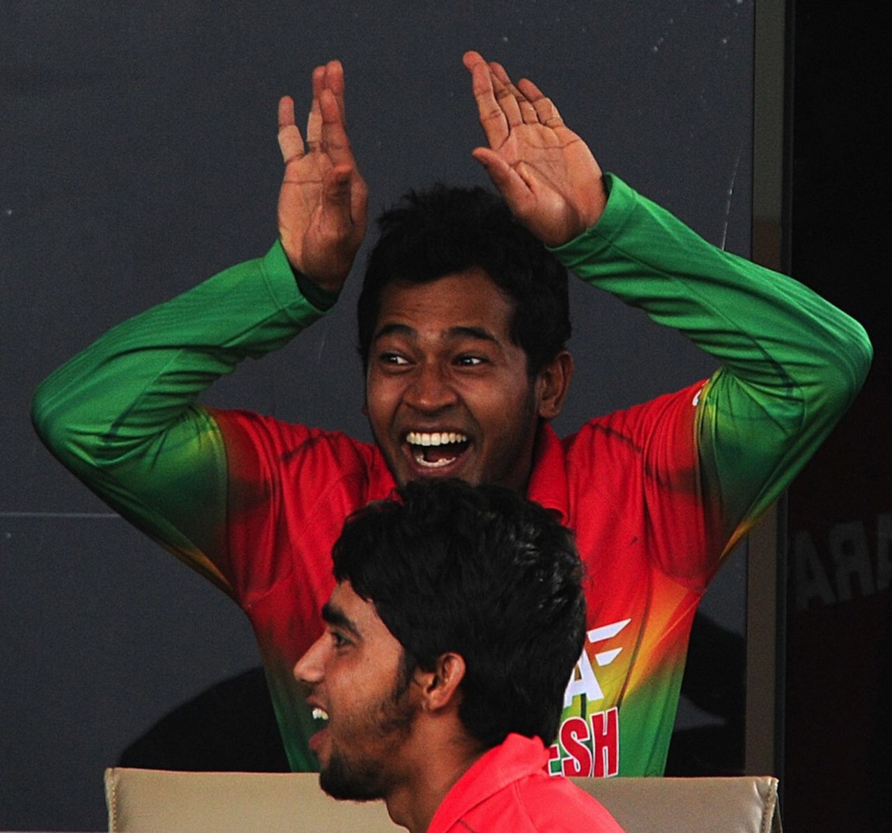 Charades? Mushfiqur Rahim entertains his teammates during the rain-break, Sri Lanka v Bangladesh, 2nd ODI, Hambantota, March 25, 2013