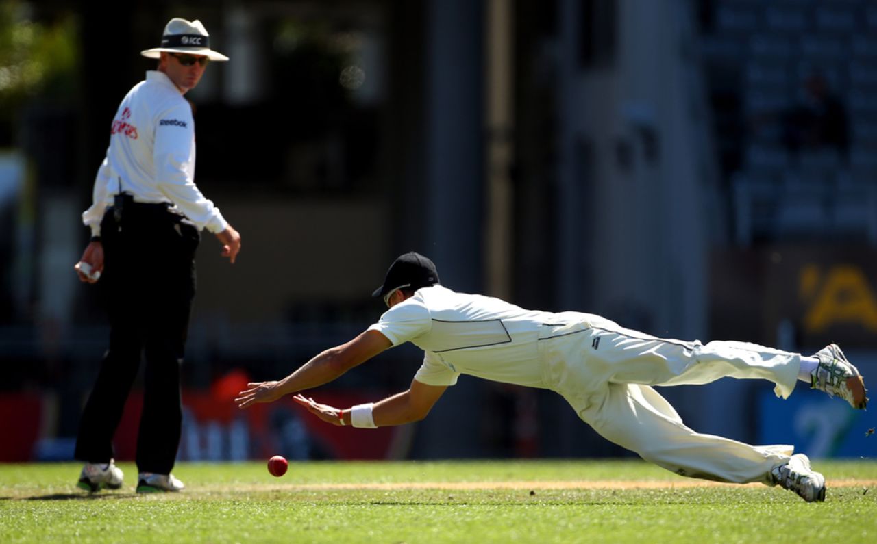 The ball evades Neil Wagner's diving attempt at a catch, New Zealand v England, 3rd Test, Auckland, 5th day, March 26, 2013