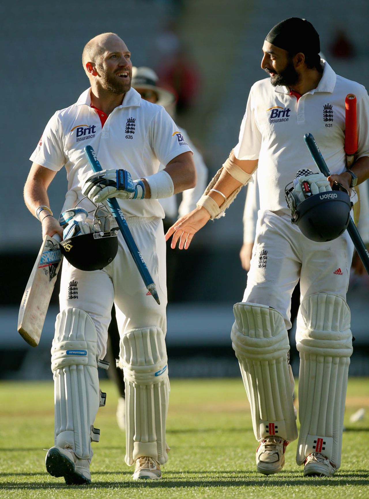 Matt Prior and Monty Panesar walk off after securing a draw, New Zealand v England, 3rd Test, Auckland, 5th day, March 26, 2013