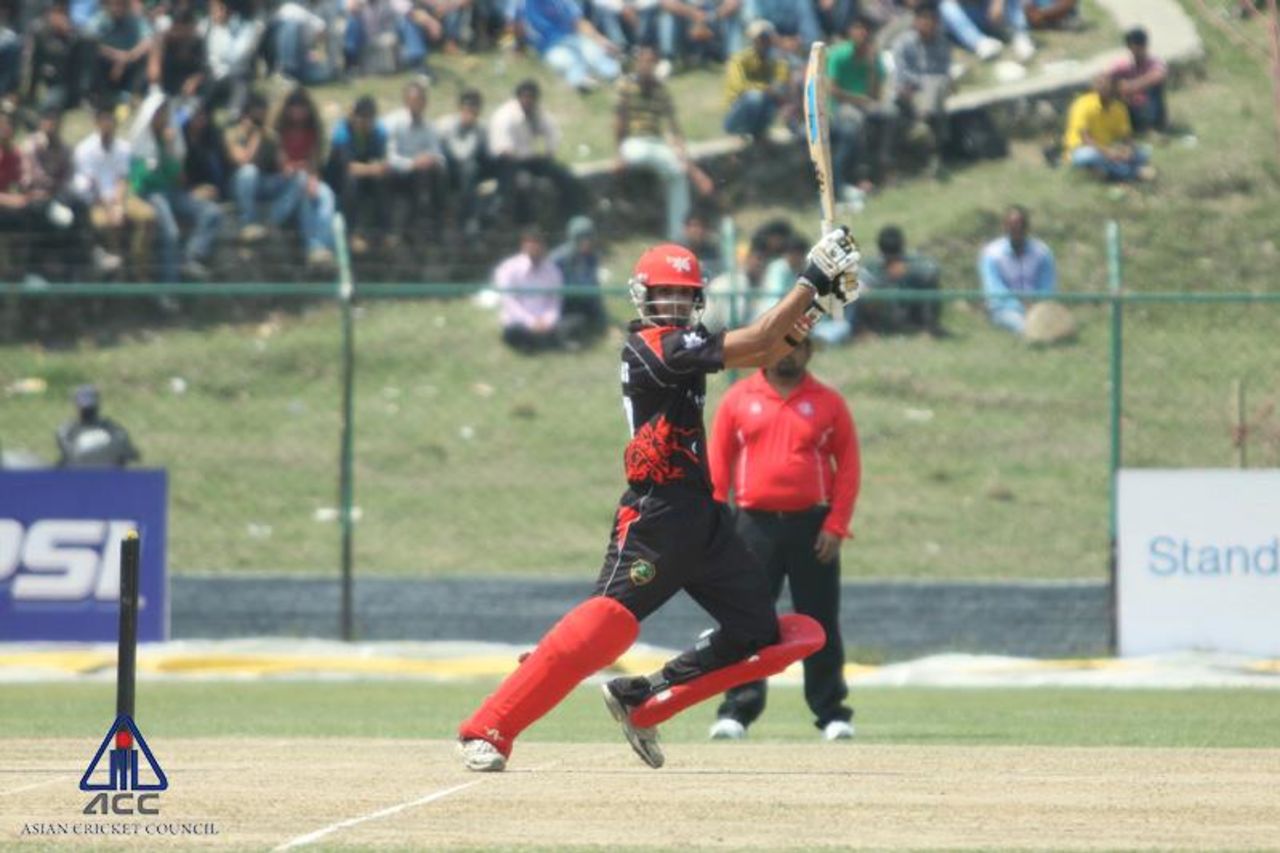 Waqas Barkat cuts the ball away during his innings of 39 against Nepal at the ACC Twenty20 Cup 2013 in Kathmandu.