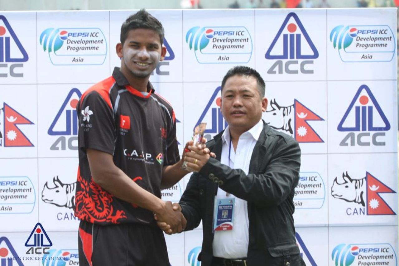 Nadeem Ahmed received the Man of the Match Award from the CAN President for his fine bowling against Nepal at the ACC Twenty20 Cup 2013 in Kathmandu