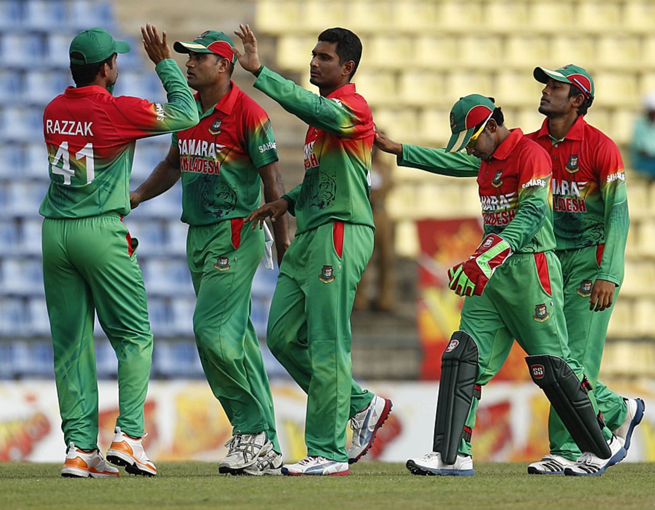 Bangladesh players celebrate the wicket of Kusal Janith Perera, Sri Lanka v Bangladesh, 3rd ODI, Pallekele, March 28, 2013