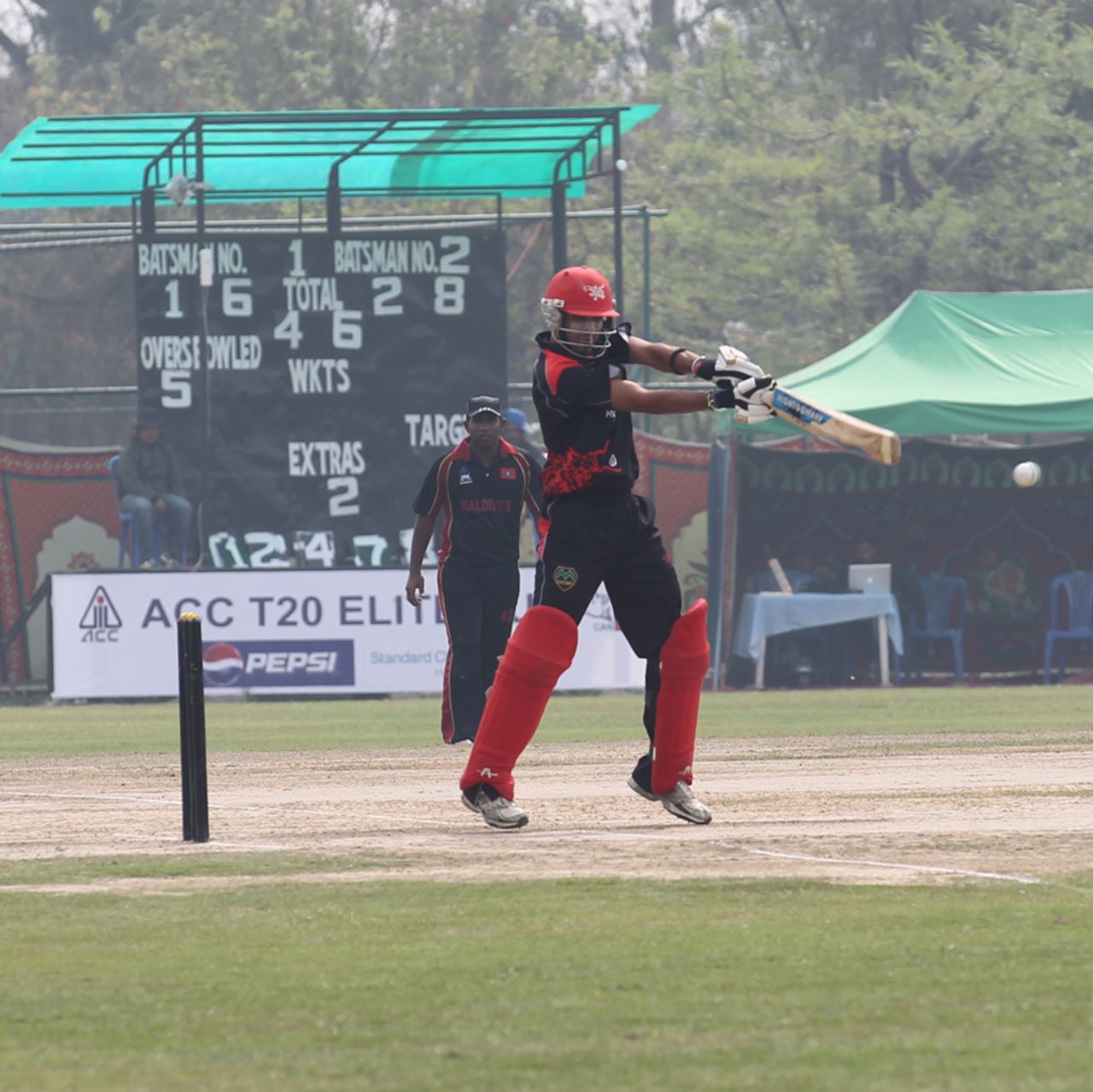 Waqas Barkat cuts the ball during his century against Maldives at the ACC Twenty20 Cup 2013 in Kathmandu