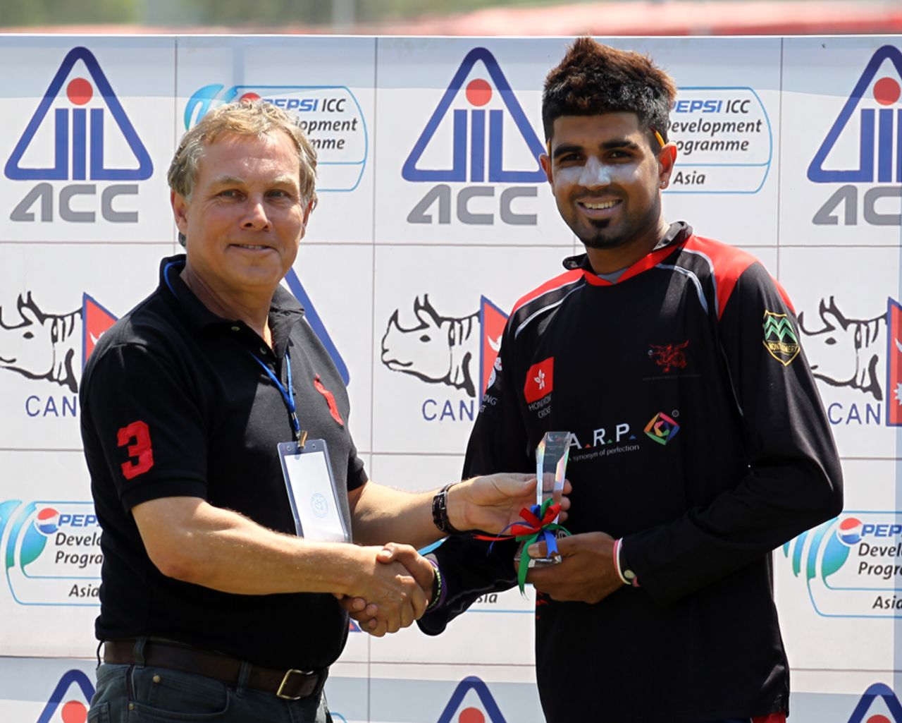 Waqas Barkat receives his Man of the Match award for his century against Maldives at the ACC Twenty20 Cup 2013 in Kathmandu