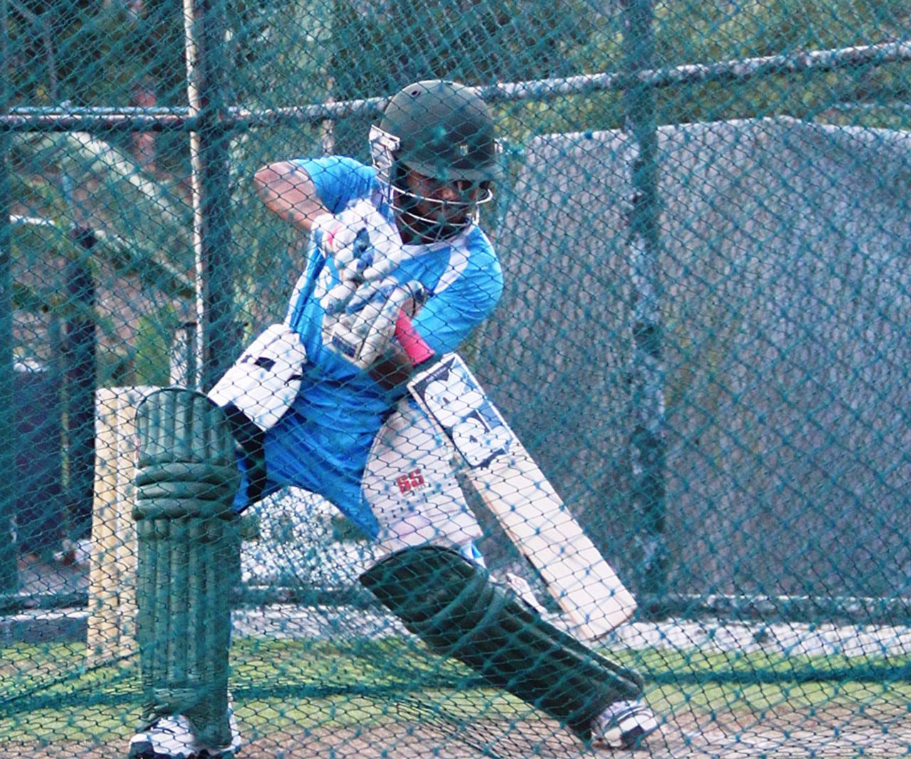 Mominul Haque plays a cut shot in the nets, Pallekele, March 30, 2013
