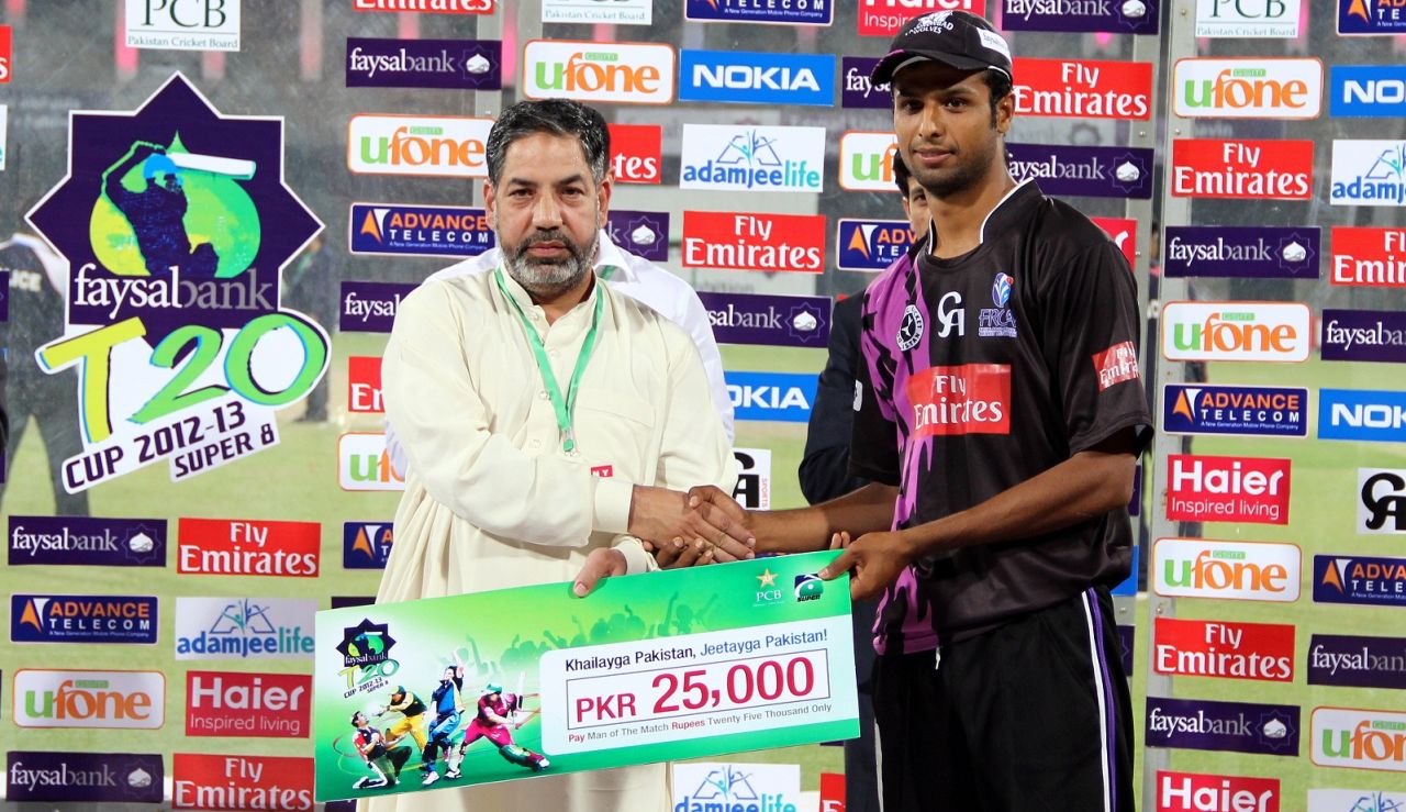 Ehsan Adil accepts the Man of the Match award, Faisalabad Wolves v Lahore Lions, Faysal Bank Super Eight T-20 Cup, Lahore, March 30, 2013