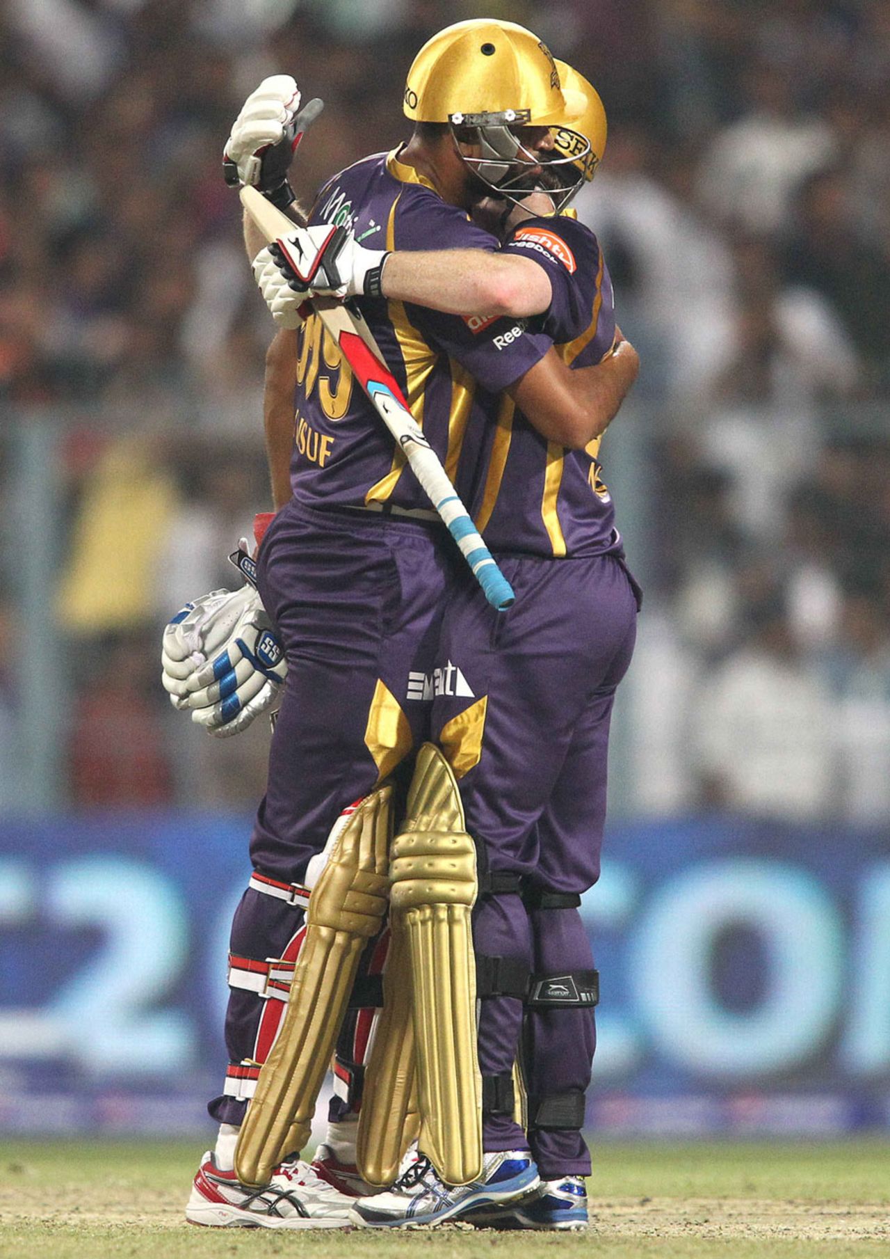 Yusuf Pathan and Eoin Morgan embrace one another after leading Kolkata Knight Riders to victory, Kolkata Knight Riders v Delhi Daredevils, IPL, Kolkata, April 3, 2013