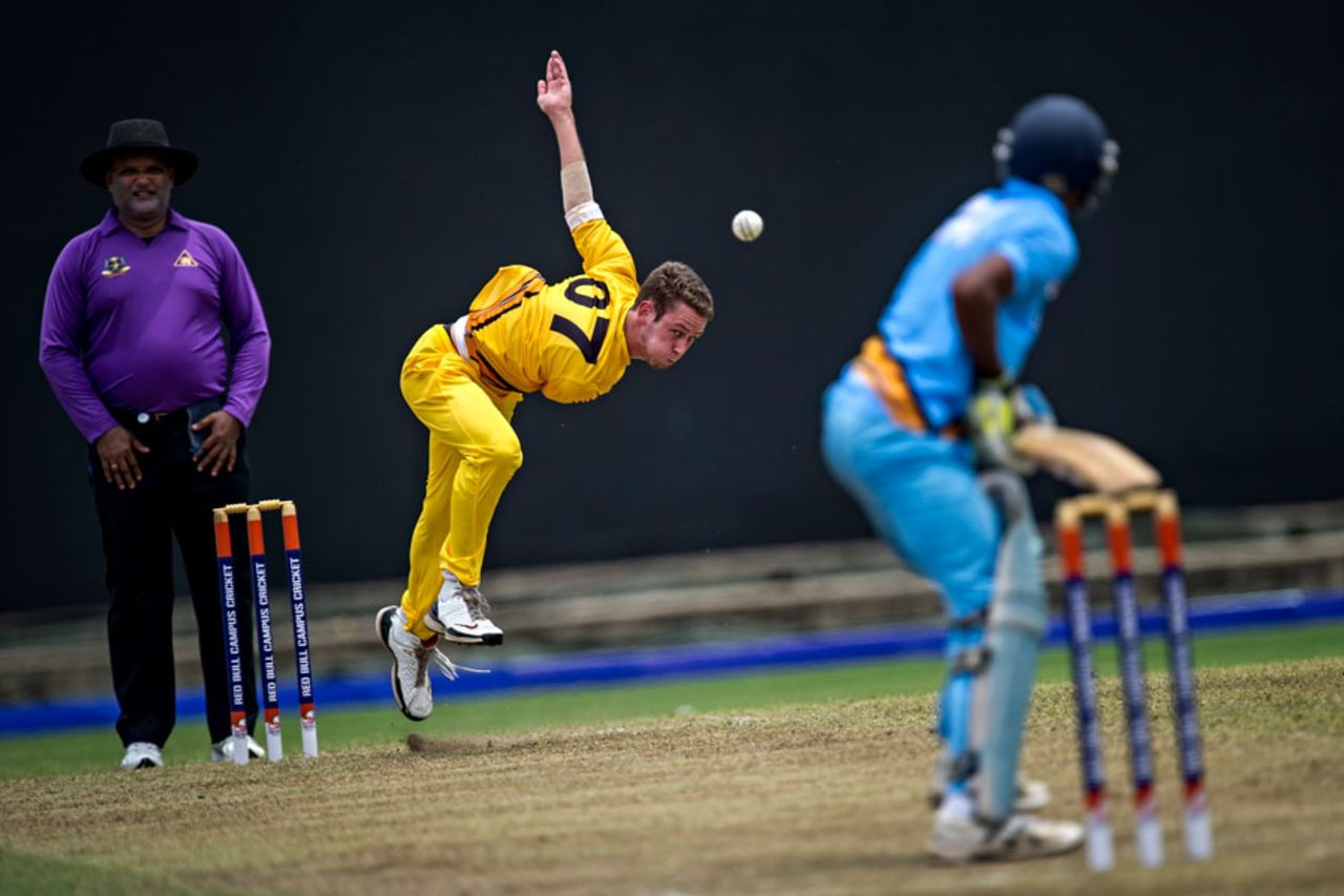 Charles Wakim completes his bowling action, University of New South Wales v D.A.V. College Chandigarh, Red Bull Campus Cricket World Final - Group A, April 3, 2013