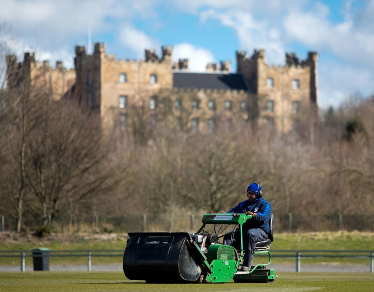 The Durham groundsman cuts the first wicket of the season, Chester-le-Street, April, 4, 2013