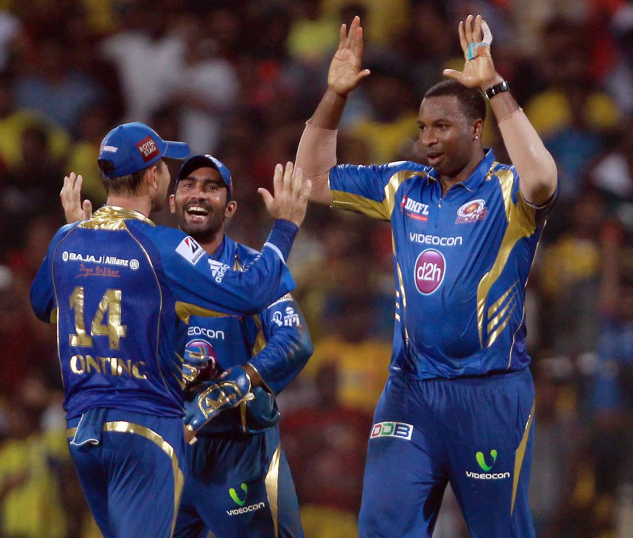 Kieron Pollard celebrates with team mates after taking a catch on the boundary, Chennai Super Kings v Mumbai Indians, IPL, Chennai, April 6, 2013