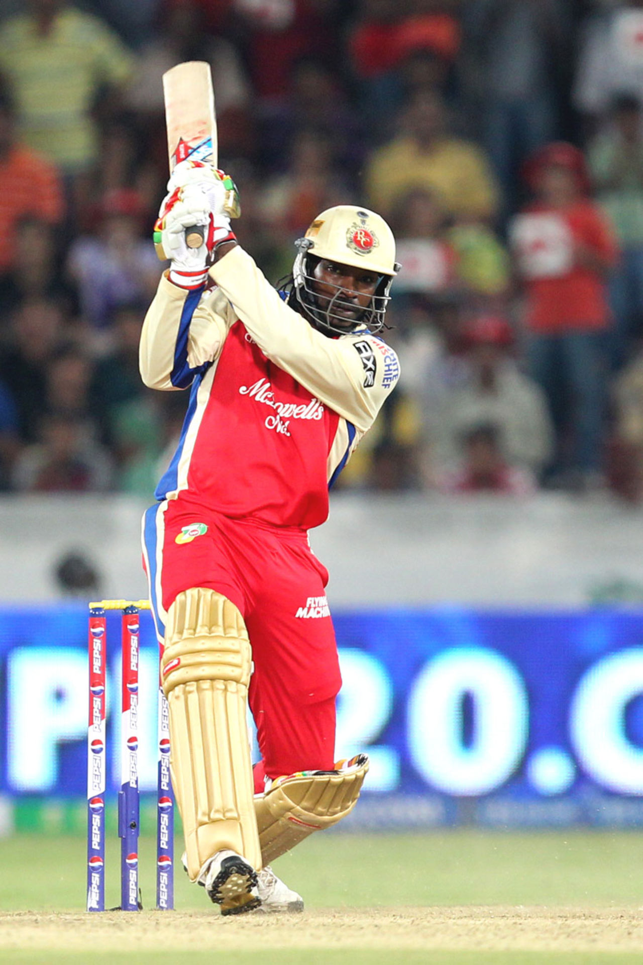 Chris Gayle smashes one down the ground, Sunrisers Hyderabad v Royal Challengers Bangalore, IPL, Hyderabad, April 7, 2013