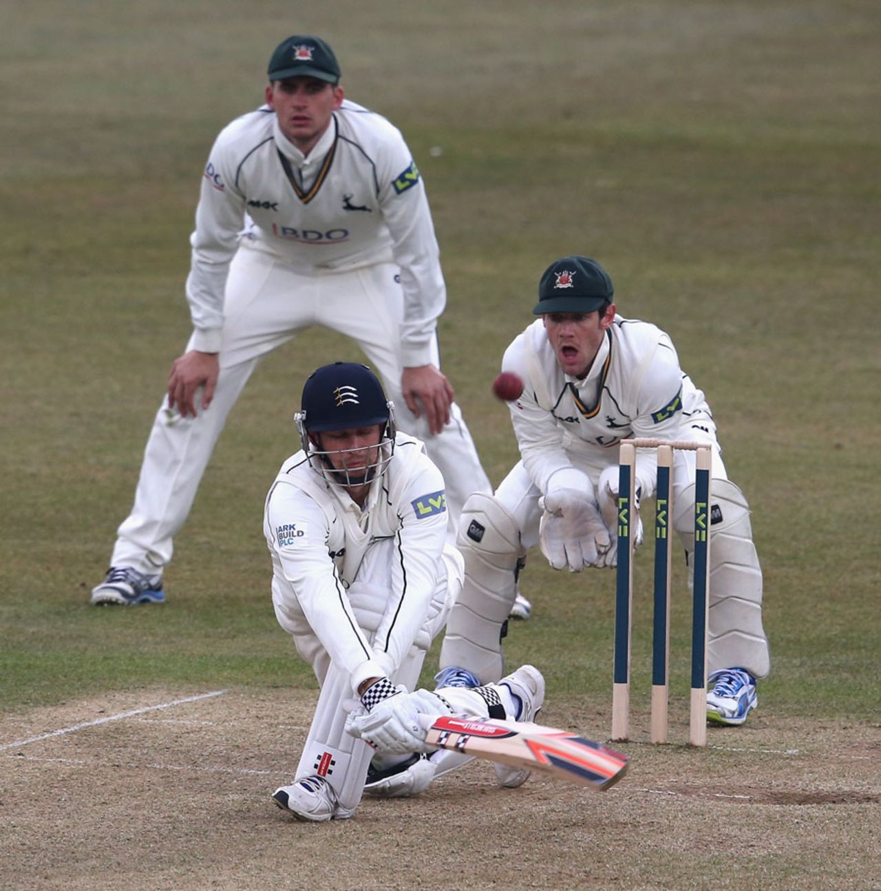 Gareth Berg sweeps during a sixth-wicket partnership of 116, Nottinghamshire v Middlesex, County Championship, Division One, Trent Bridge, 2nd day, April 11, 2013