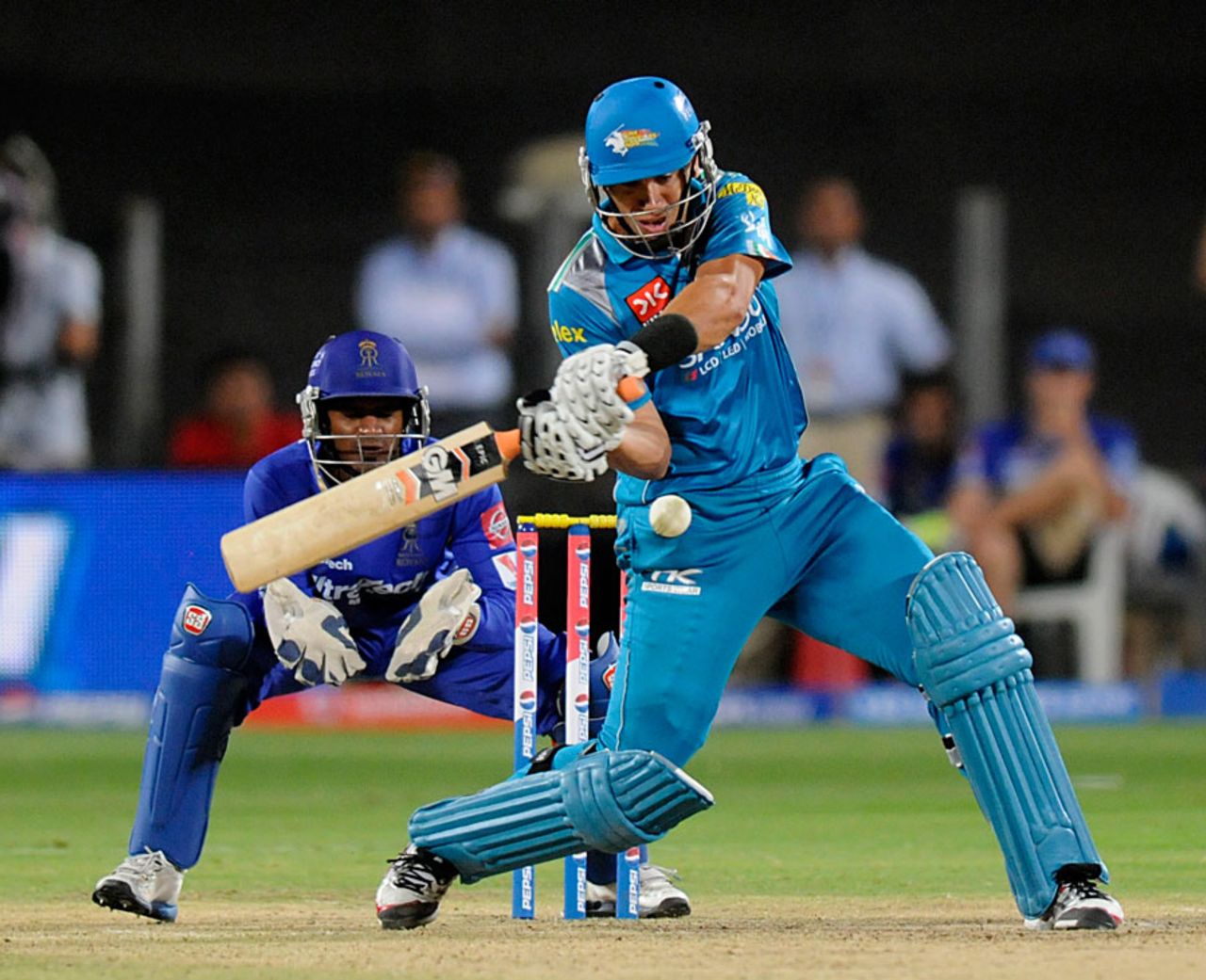 Ross Taylor about to play the slog sweep, Pune Warriors v Rajasthan Royals, IPL, Pune, April 11, 2013