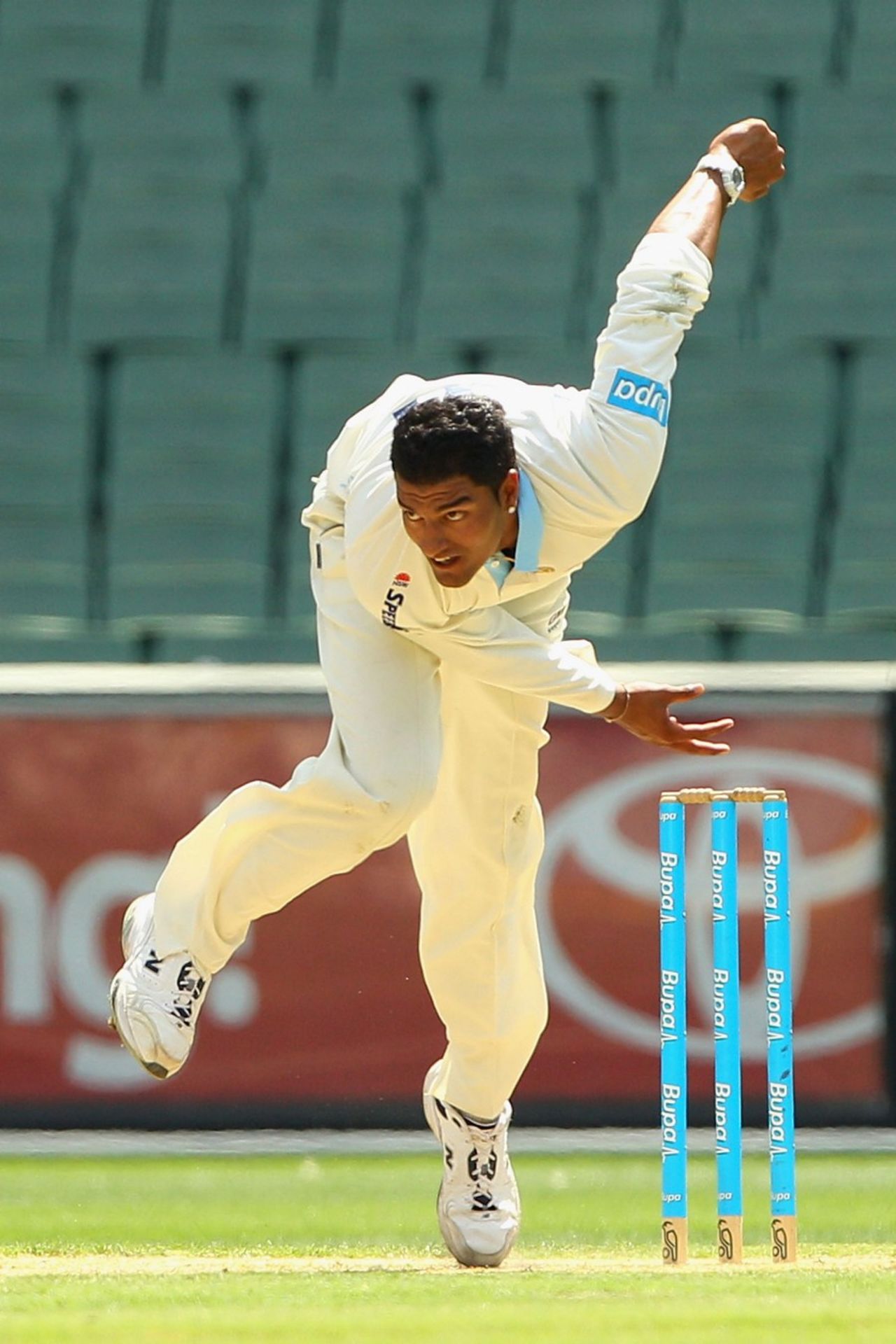 Gurinder Sandhu sends down a delivery, Victoria v New South Wales, Sheffield Shield, Melbourne, March 7, 2013