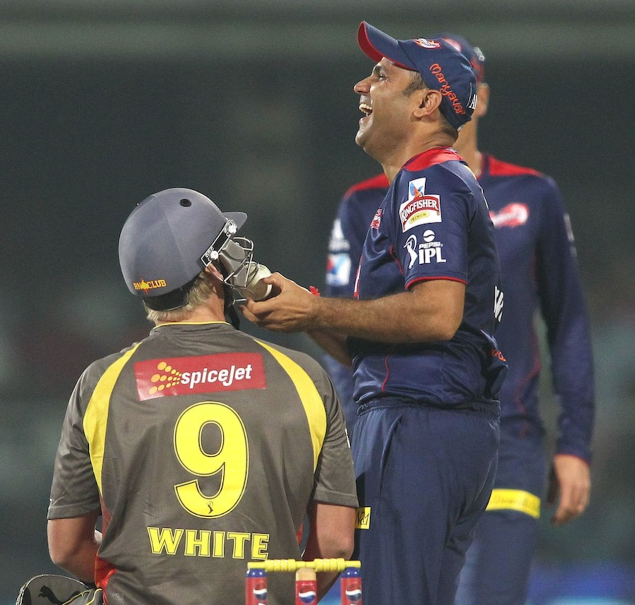 Virendar Sehwag tries to squeeze the ball out of Cameron White's grill, Delhi Daredevils v Sunrisers Hyderabad, IPL, Delhi, April 12, 2013
