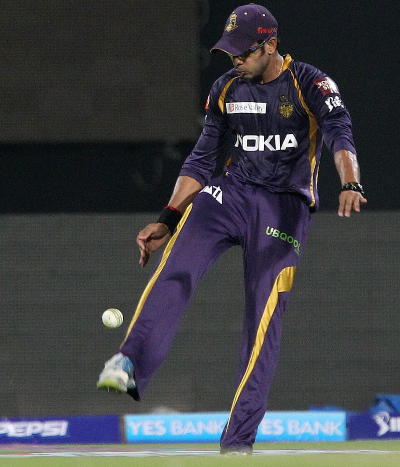 Manoj Tiwary kicks the ball after taking a catch, Kolkata Knight Riders v Sunrisers Hyderabad, IPL, Kolkata, April 14, 2013