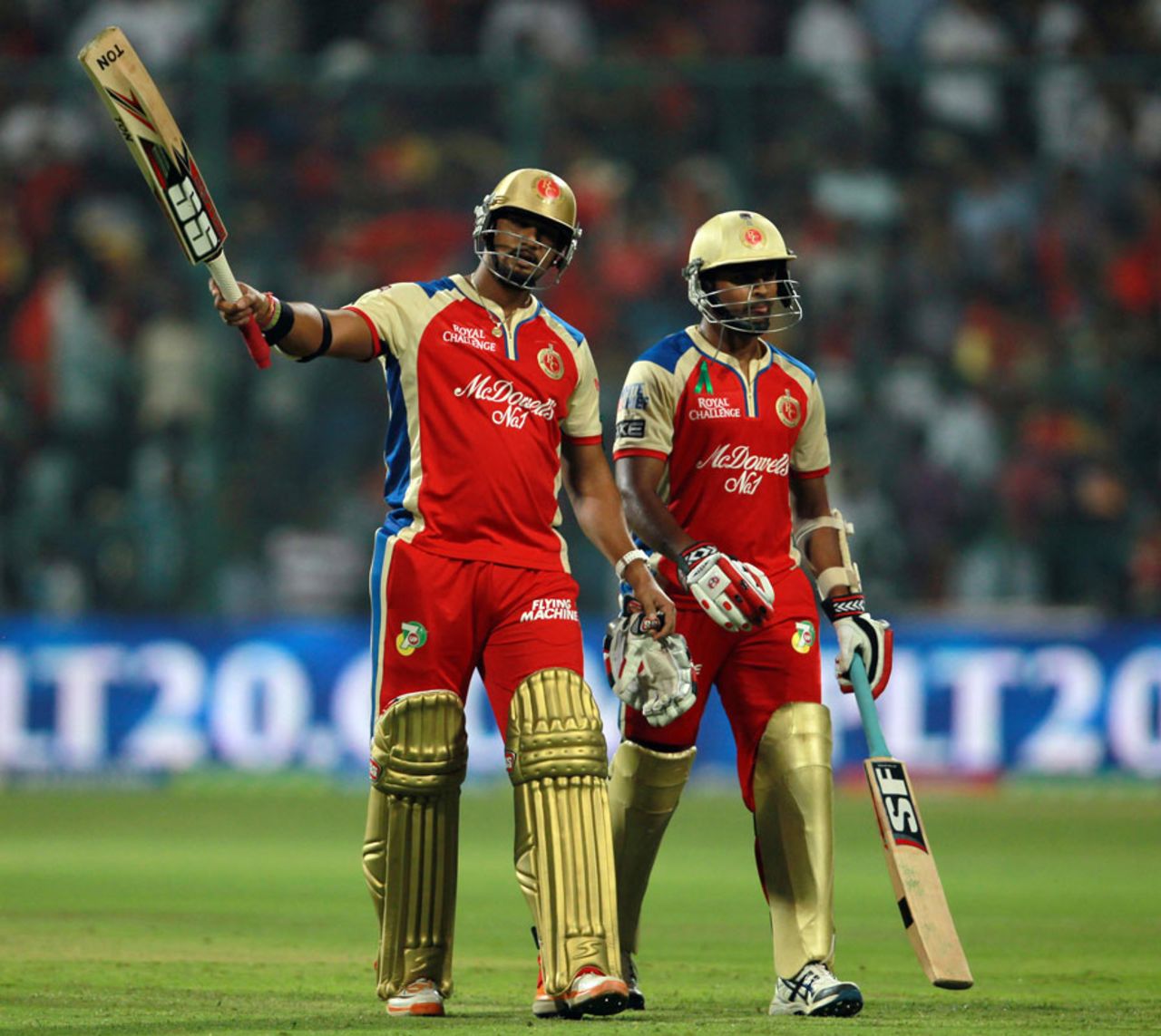 Ravi Rampaul and Vinay Kumar walk off after the match ended in a tie, Royal Challengers Bangalore v Delhi Daredevils, IPL 2013, Bangalore, April 16, 2013