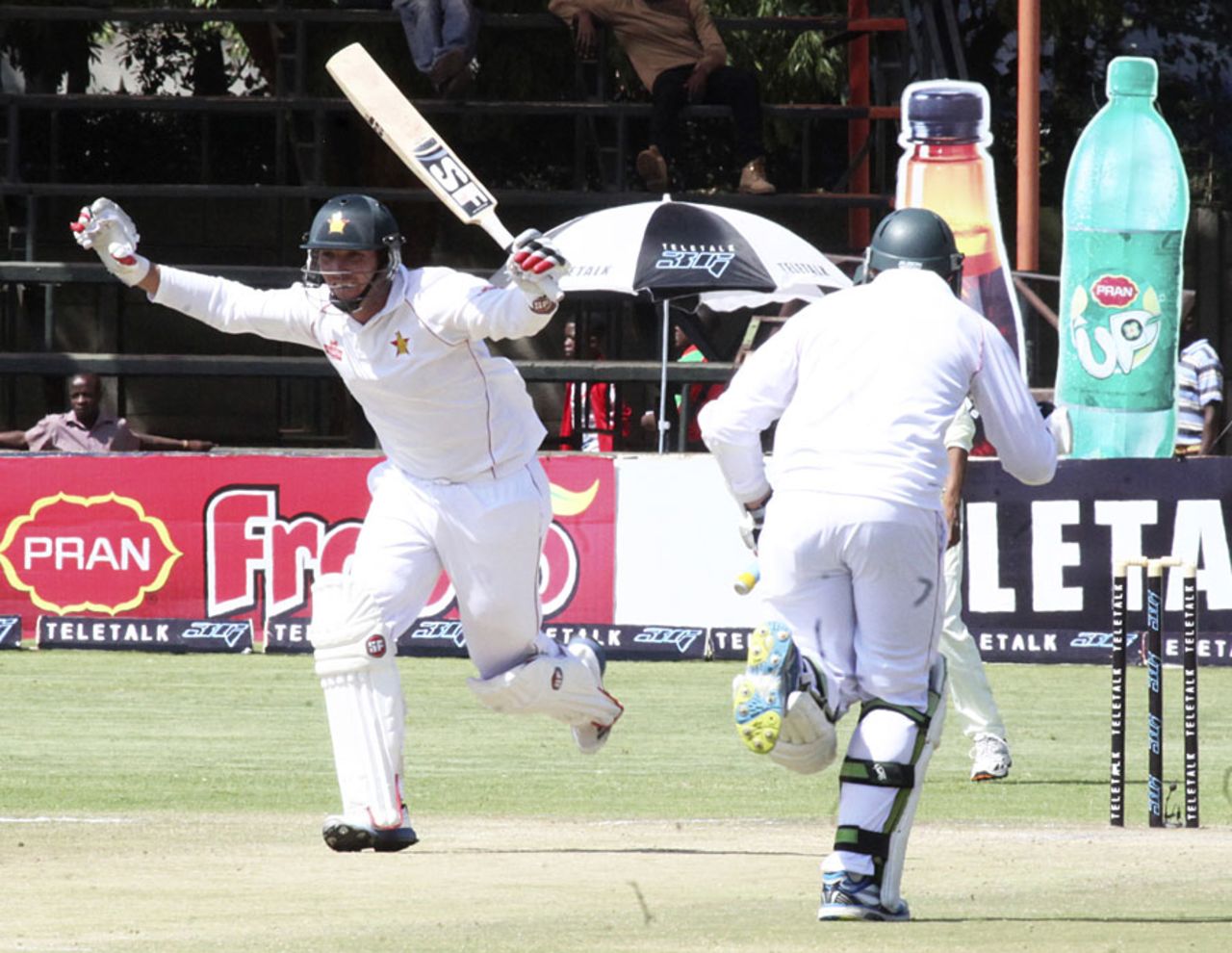 Brendan Taylor runs through to complete his second century of the match, Zimbabwe v Bangladesh, 1st Test, 4th day, Harare, April 20, 2013