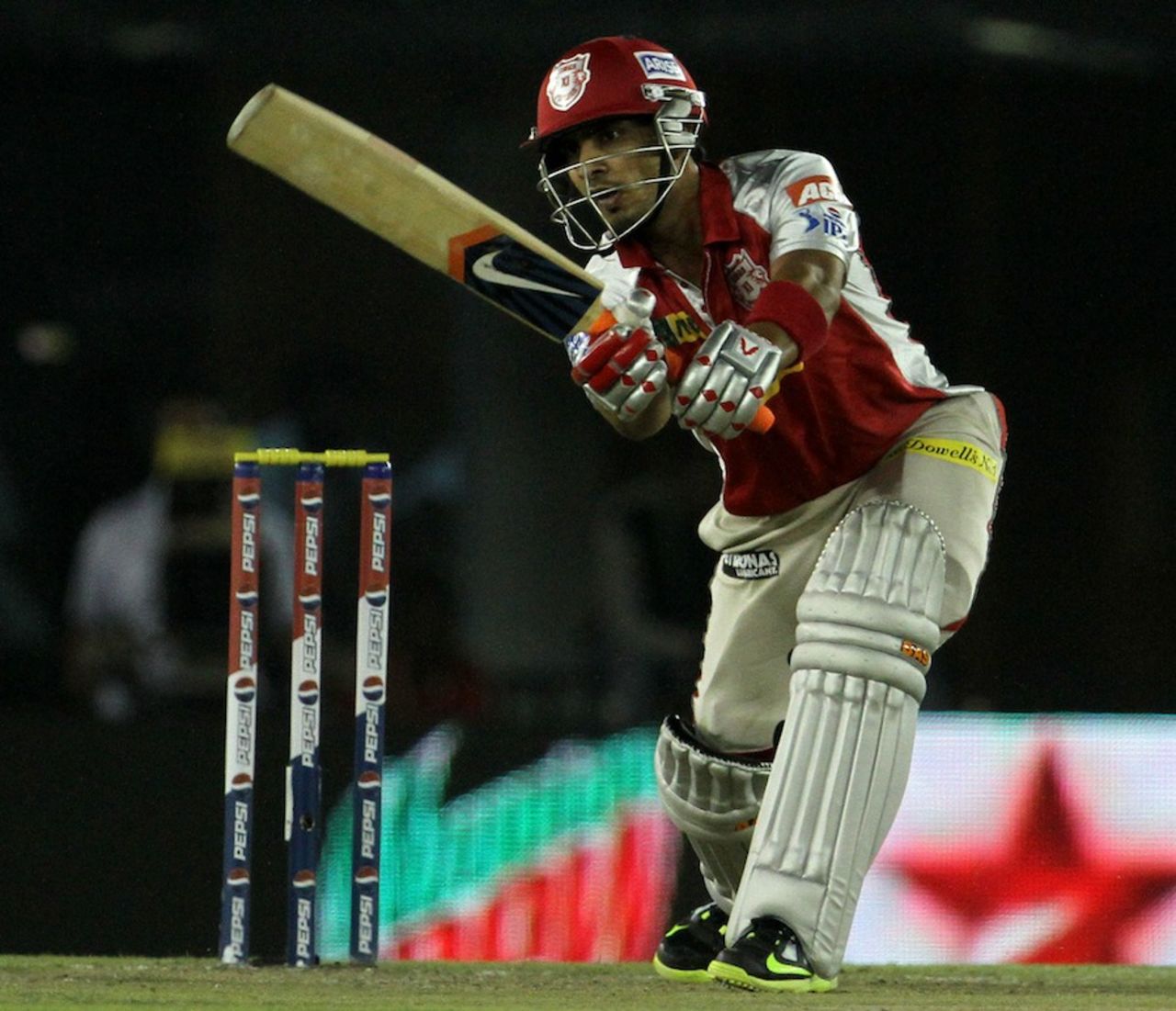 Mandeep Singh scored the first fifty of the season for his team, Kings XI Punjab v Pune Warriors, IPL, Mohali, April 21, 2013