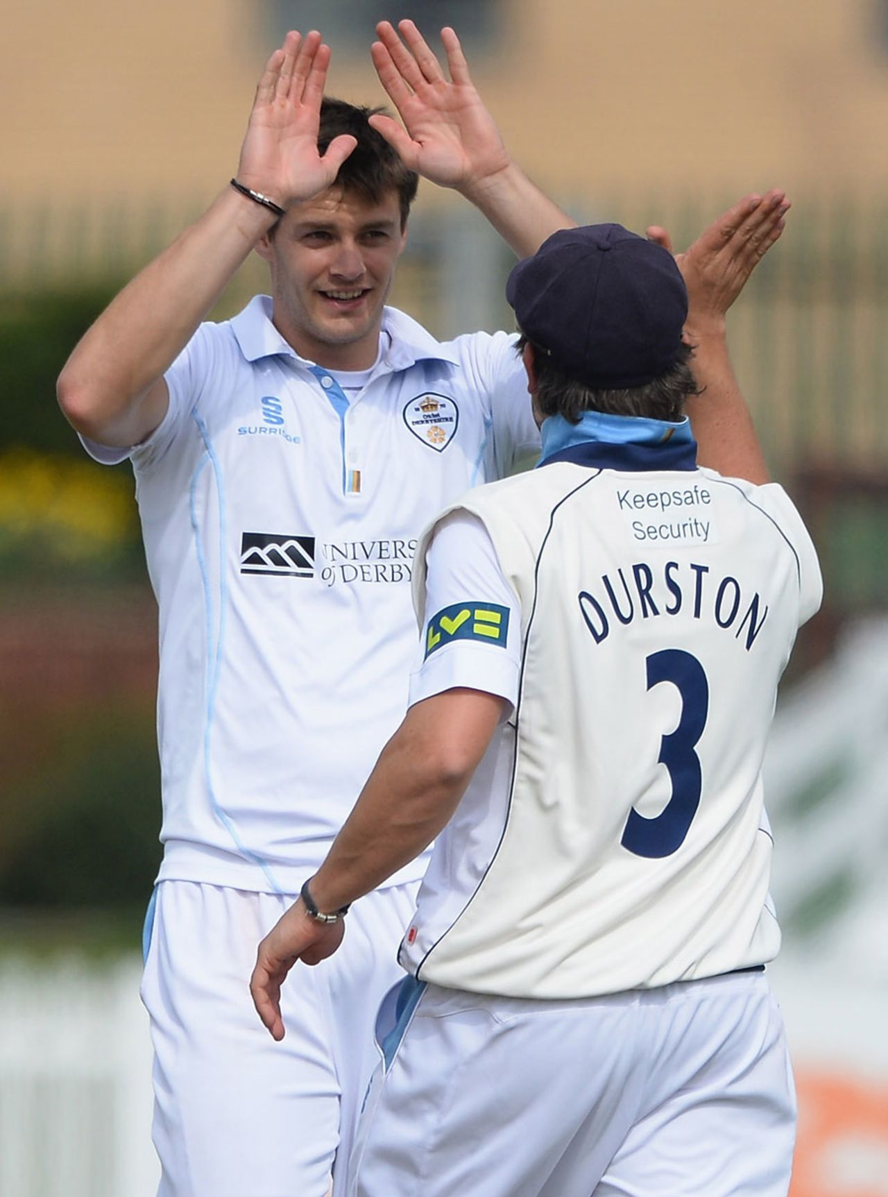 Jonathan Clare gets a high five from Wes Durston, Derbyshire v Nottinghamshire, County Championship, Division One, Derby, 2nd day, April 25, 2013