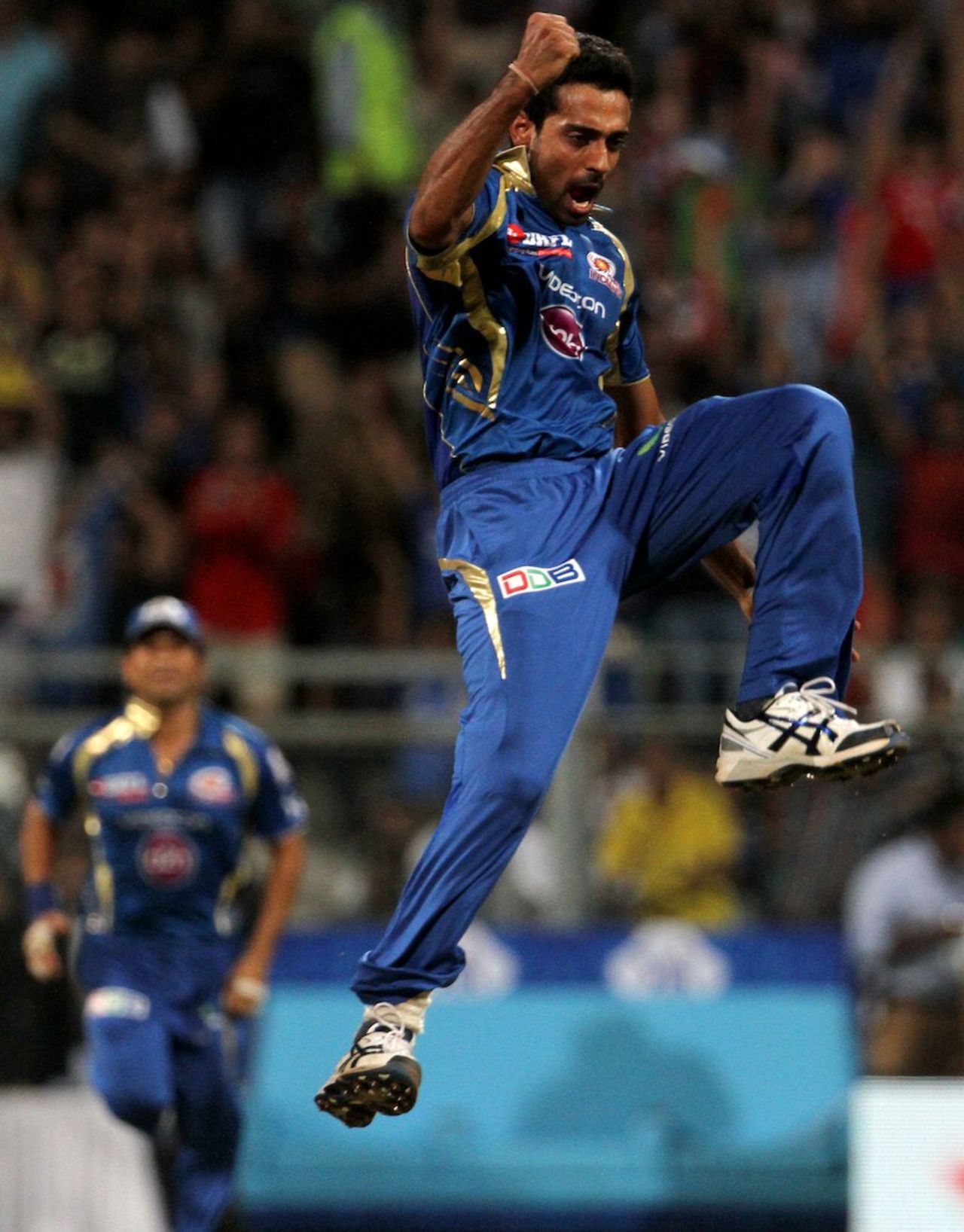 A jubilant Dhawal Kulkarni leaps in celebration, Mumbai Indians v Royal Challengers Bangalore, IPL, Mumbai, April 27, 2013