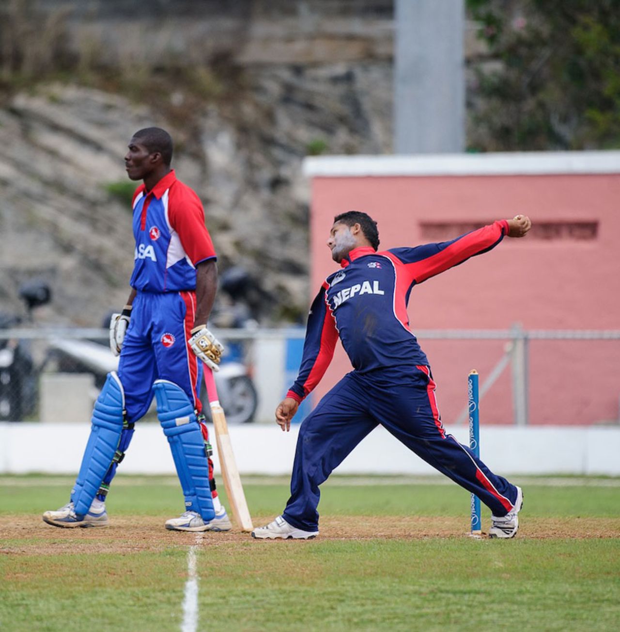 Basanta Regmi sends down a ball, Nepal v United States of America, ICC World Cricket League Division Three, Somerset, Bermuda, April 28, 2013