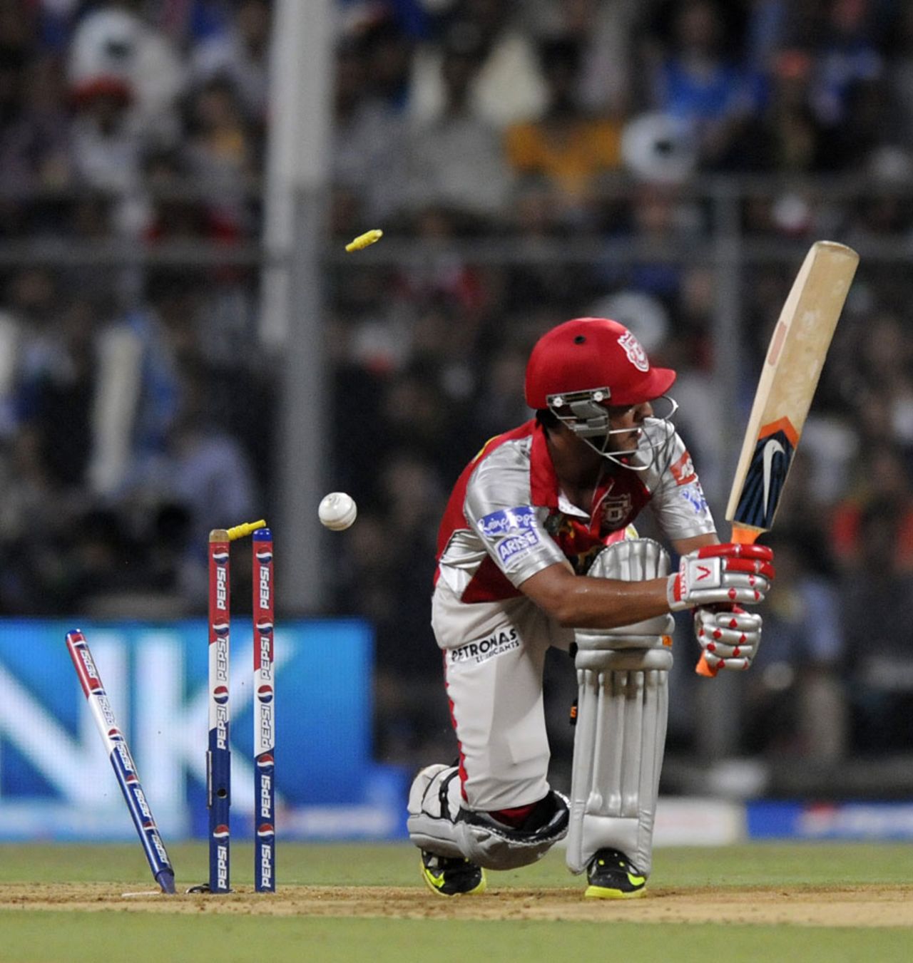 Mandeep Singh's stumps are shattered by a Lasith Malinga delivery, Mumbai Indians v Kings XI Punjab, IPL 2013, Mumbai, April 29, 2013
