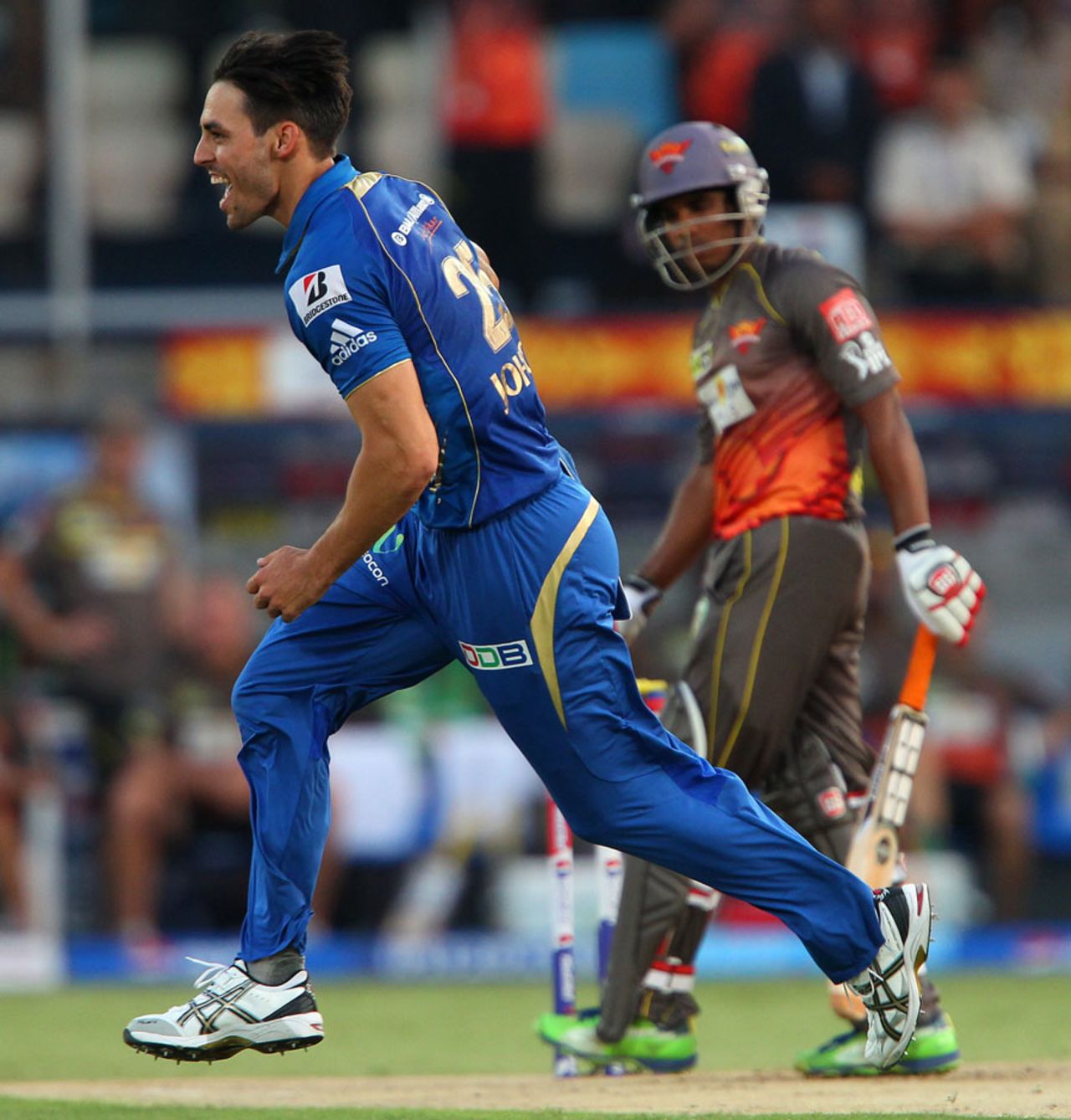Mitchell Johnson exults after picking up Akshath Reddy, Sunrisers Hyderabad v Mumbai Indians, IPL, Hyderabad, May 1, 2013
