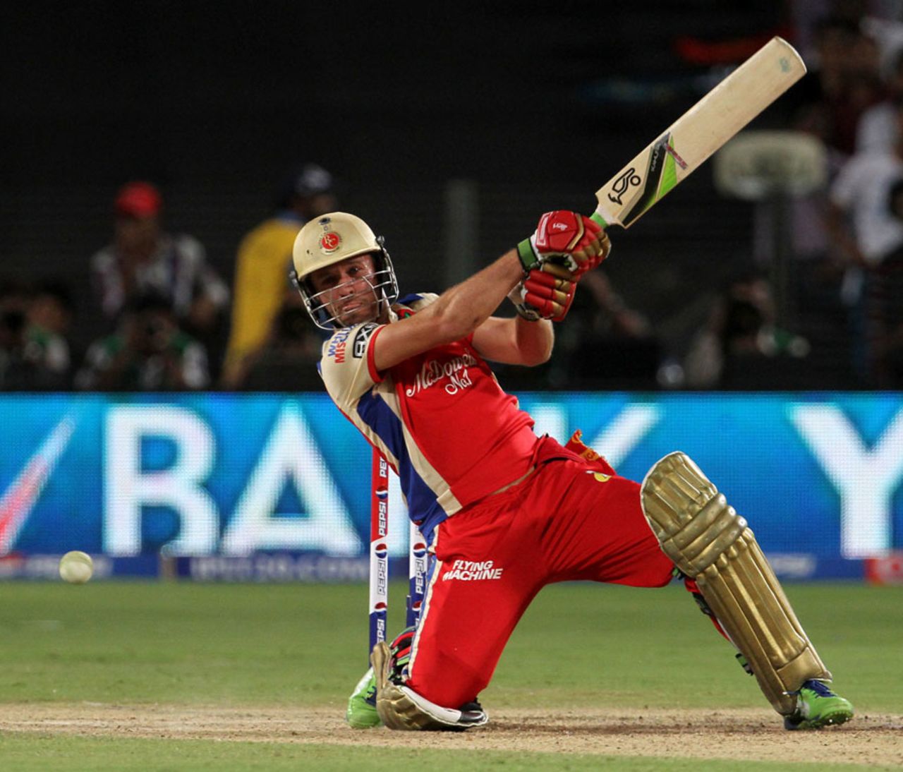 AB de Villiers launches the ball through the off side, Pune Warriors v Royal Challengers Bangalore, IPL 2013, Pune, May 2, 2013