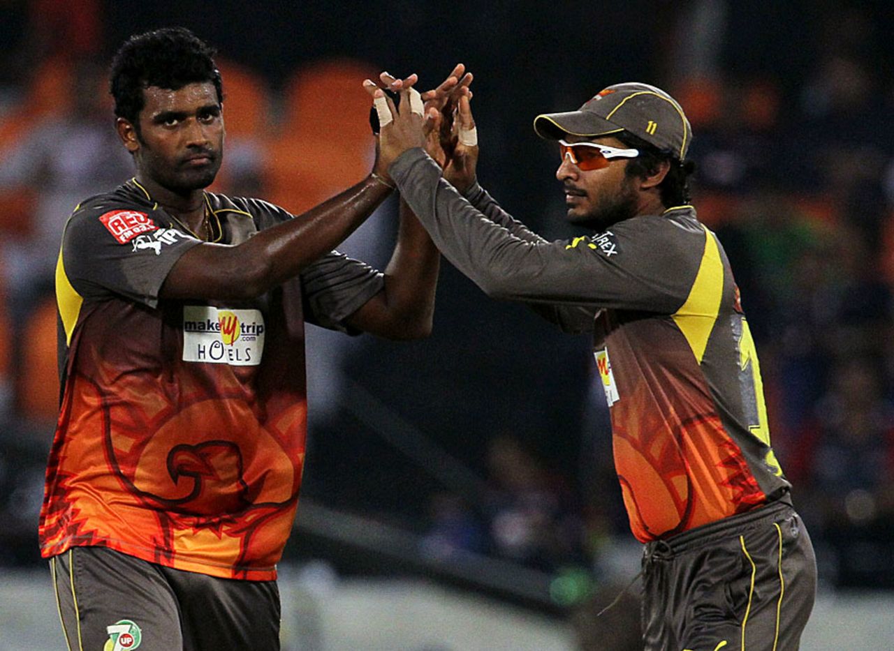 Thisara Perera and Kumar Sangakkara celebrate a wicket, Sunrisers Hyderabad v Delhi Daredevils, IPL, Hyderabad, May 4, 2013