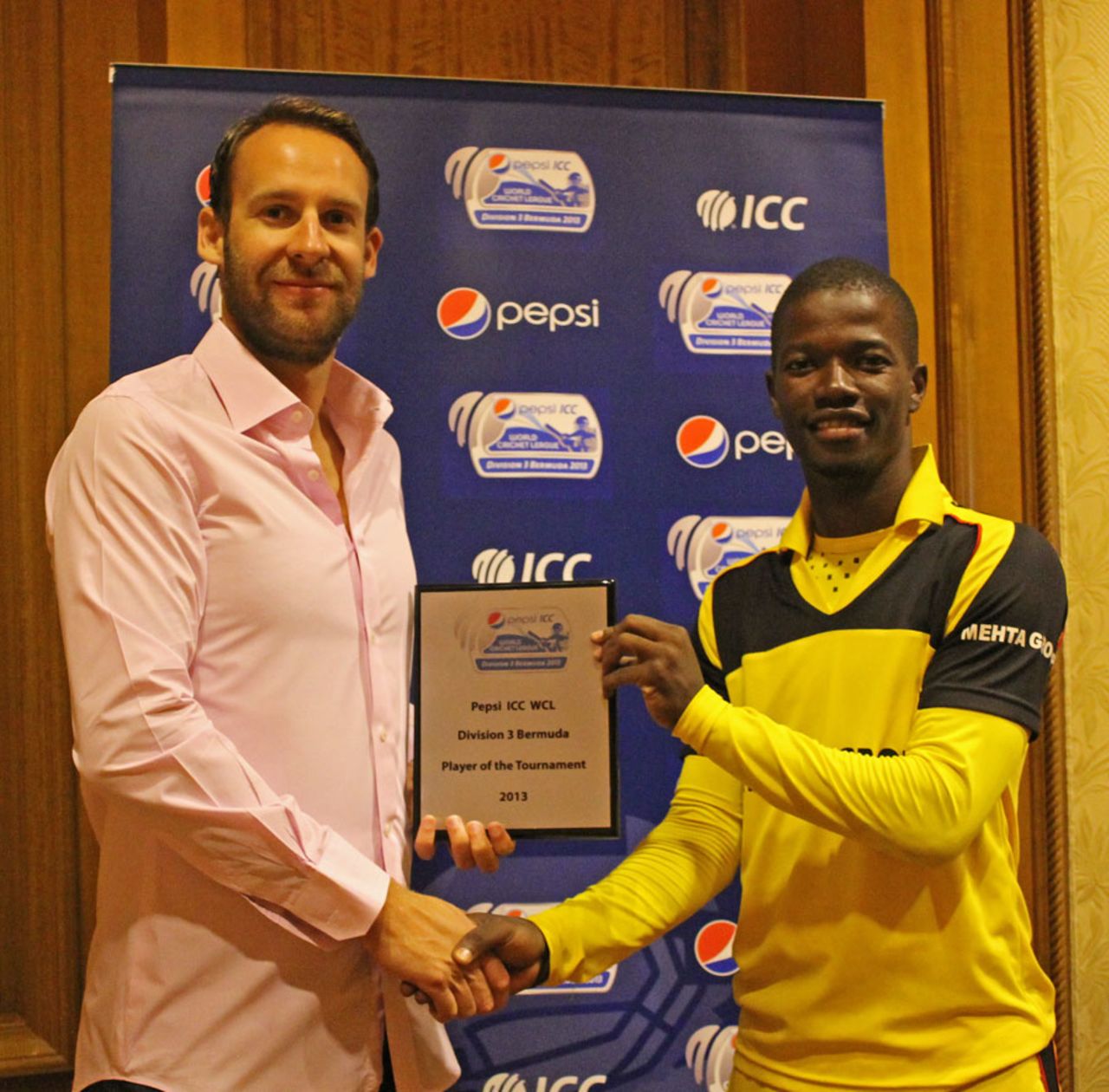 Uganda captain Davis Arinaitwe collects his Player of the Series award, Nepal v Uganda, World Cricket League Division 3, final, Hamilton, May 5, 2013