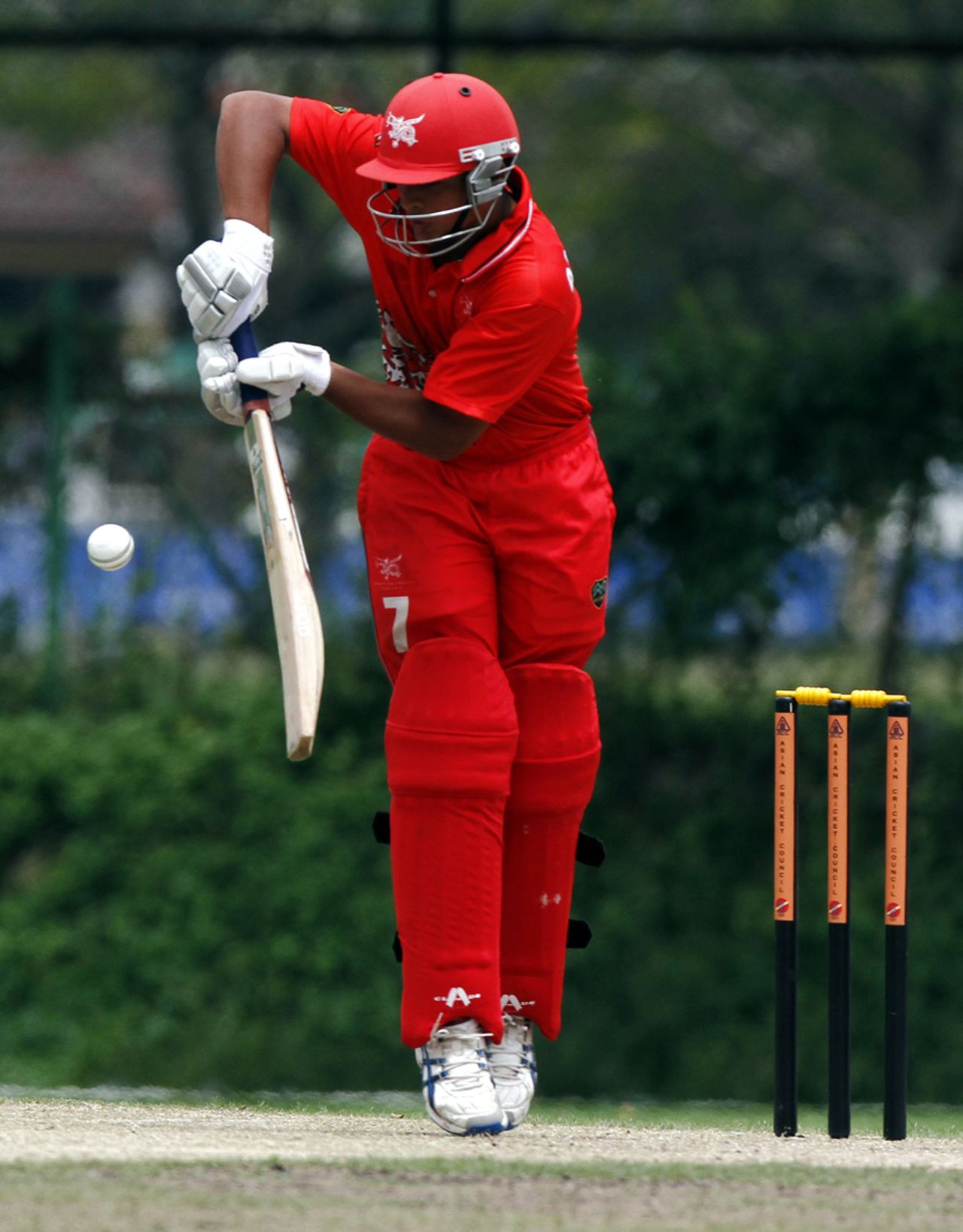 Anshuman Rath gets up on his toes to defend a ball during his innings of 81 against UAE U19 at the Kinrara Oval during the ACC Under-19 Elite 2013 being played in Kuala Lumpur, Malaysia