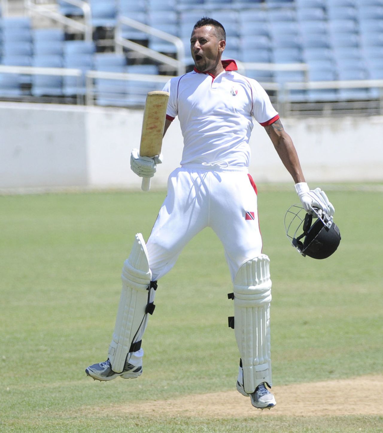 Rayad Emrit celebrates after Trinidad & Tobago scored the winning runs, Jamaica v Trindad and Tobago, Regional Four Day Competition, semi-final, 4th day, May 5, 2013