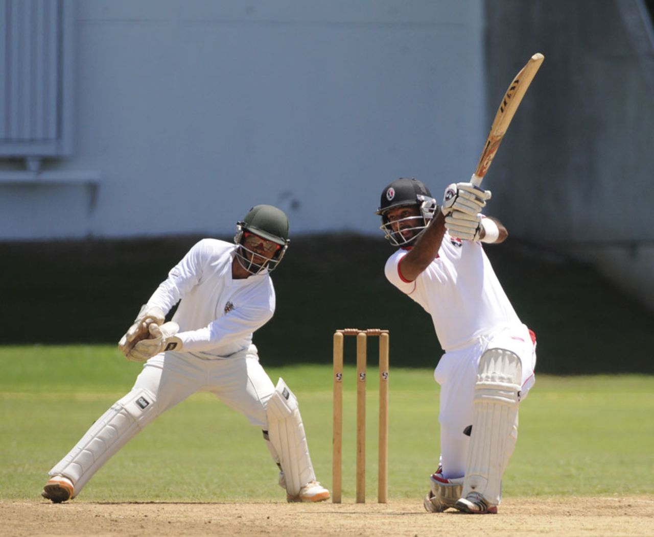Imran Khan drives through the offside during his unbeaten 50, Jamaica v Trindad and Tobago, Regional Four Day Competition, semi-final, 4th day, May 5, 2013