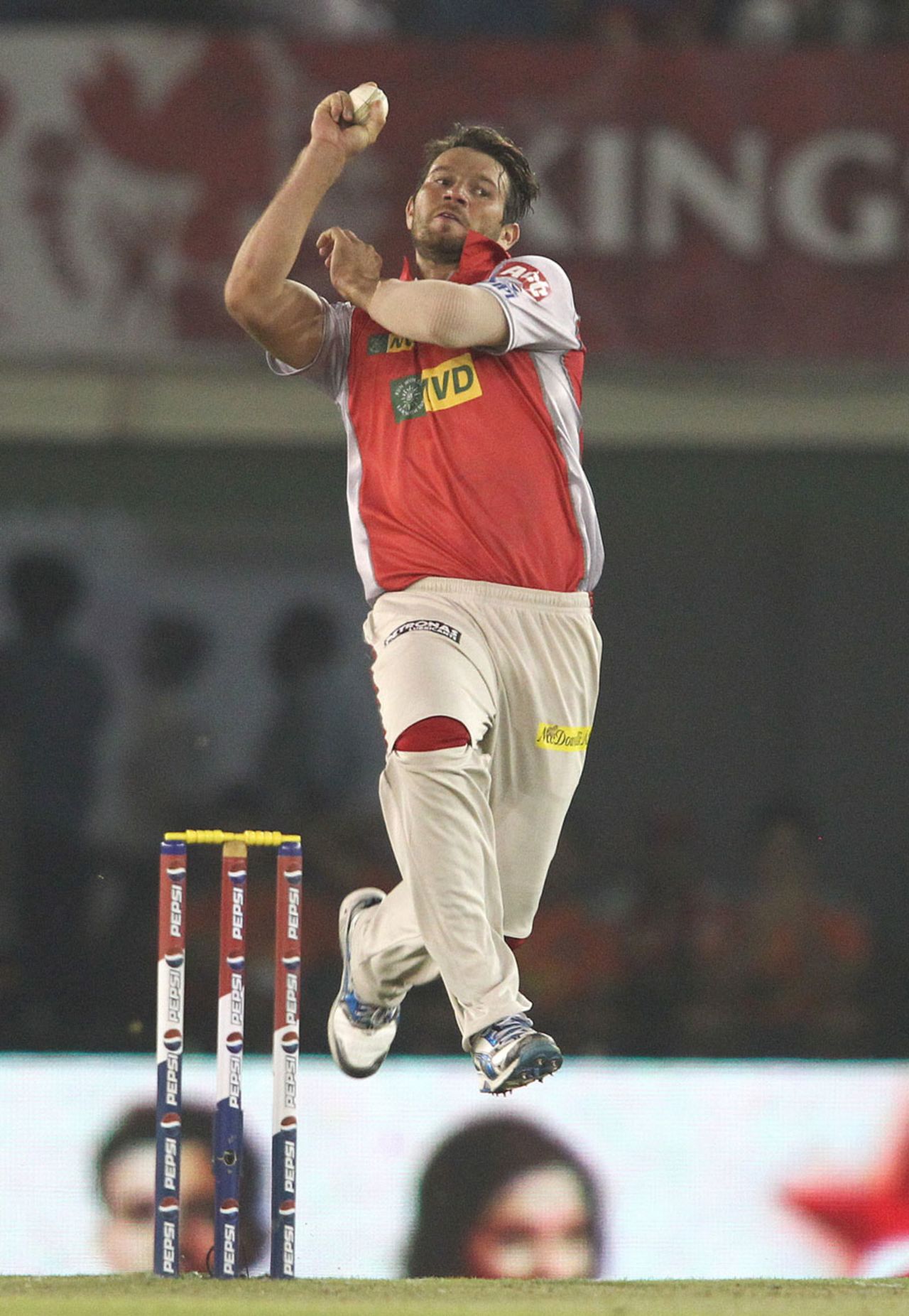 Michael Neser in his delivery stride, Kings XI Punjab v Royal Challengers Bangalore, IPL 2013, Mohali, May 6, 2013