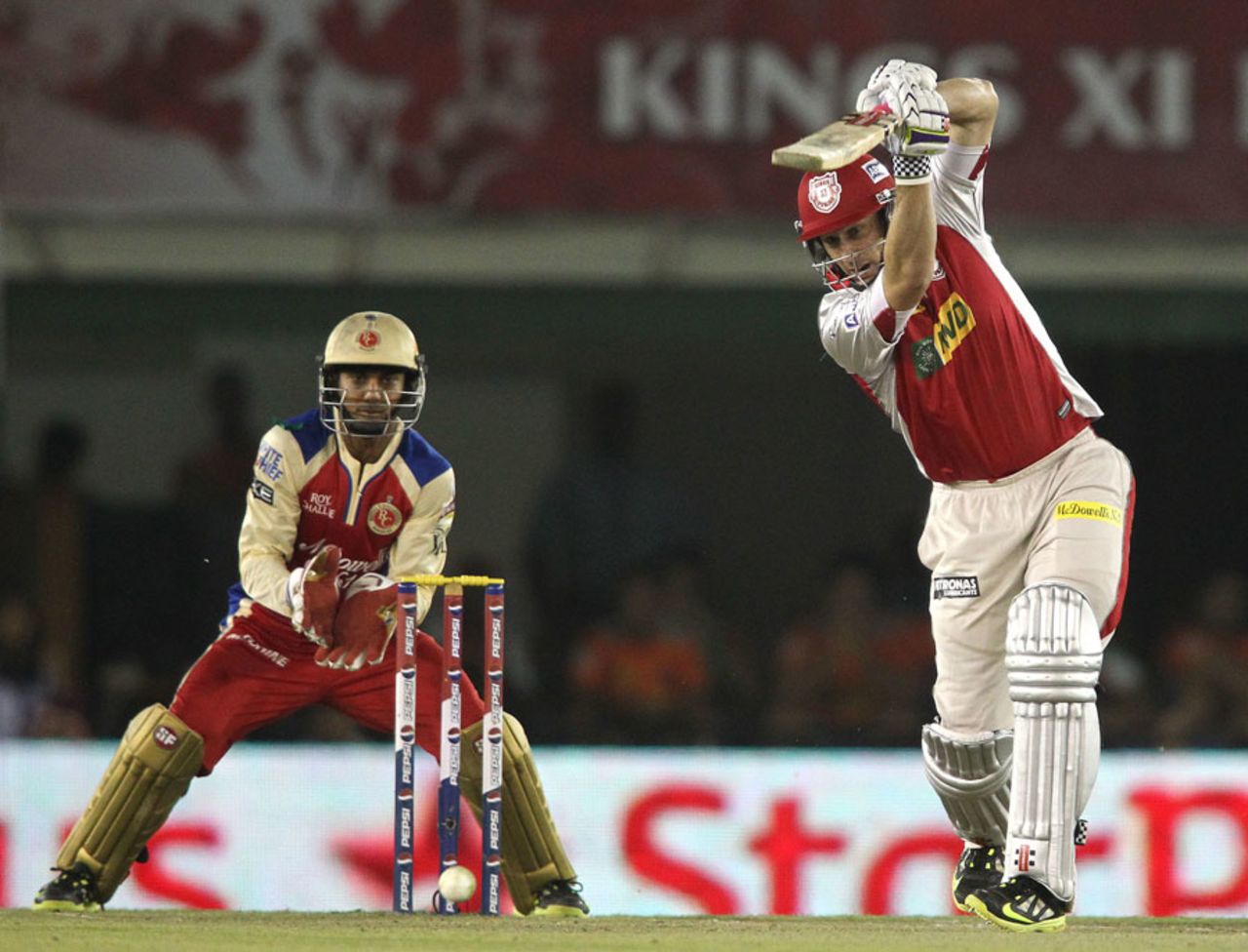 David Hussey drives a ball through the offside, Kings XI Punjab v Royal Challengers Bangalore, IPL 2013, Mohali, May 6, 2013