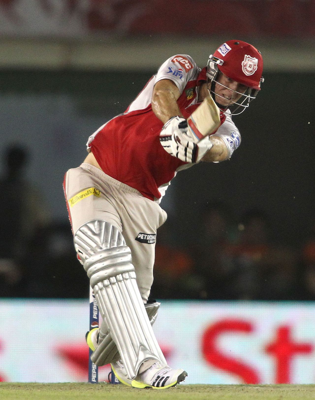 David Miller hits a shot during his unbeaten hundred, Kings XI Punjab v Royal Challengers Bangalore, IPL 2013, Mohali, May 6, 2013 