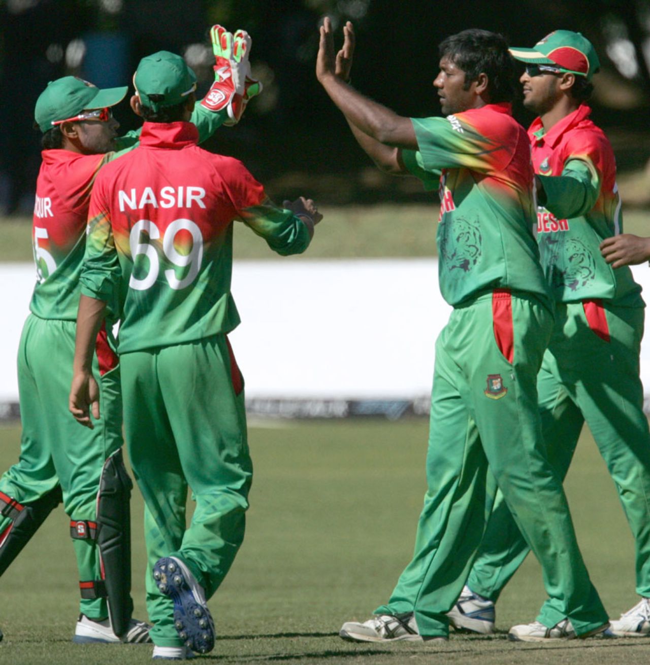 Robiul Islam celebrates a wicket with team mates, Zimbabwe v Bangladesh, 3rd ODI, Bulawayo, May 8, 2013