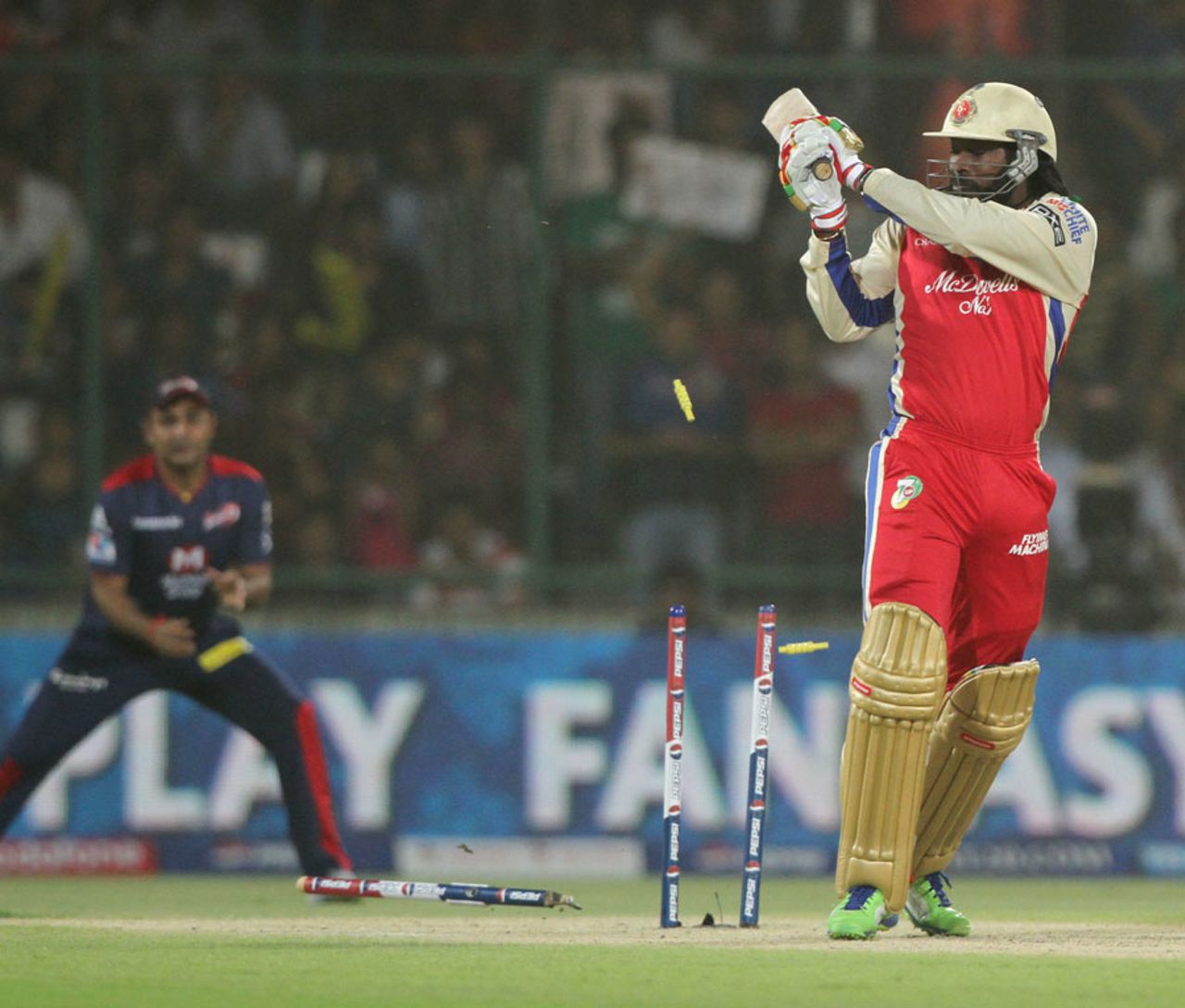 Chris Gayle's stumps are rattled by Irfan Pathan, Delhi Daredevils v Royal Challengers Bangalore, IPL 2013, Delhi, May 10, 2013
