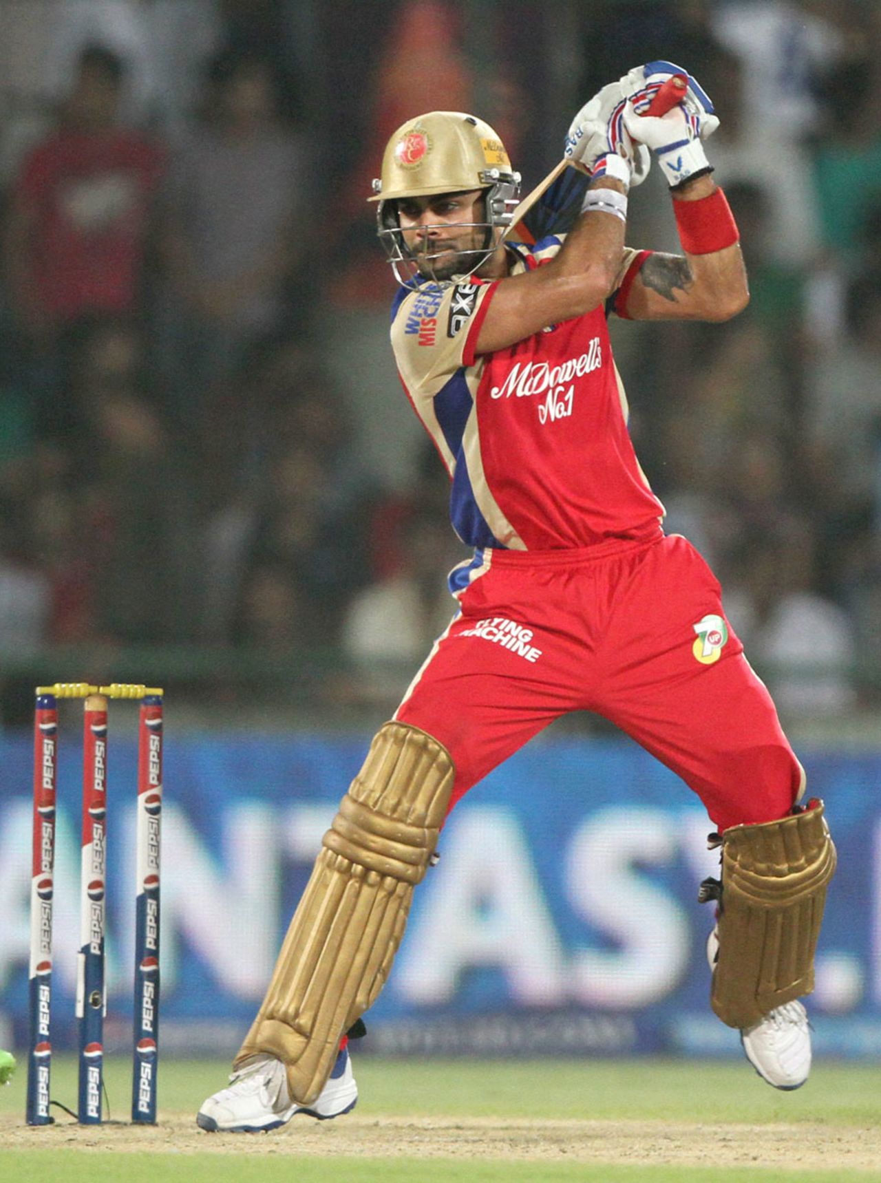 Virat Kohli punches a shot through the offside, Delhi Daredevils v Royal Challengers Bangalore, IPL 2013, Delhi, May 10, 2013
