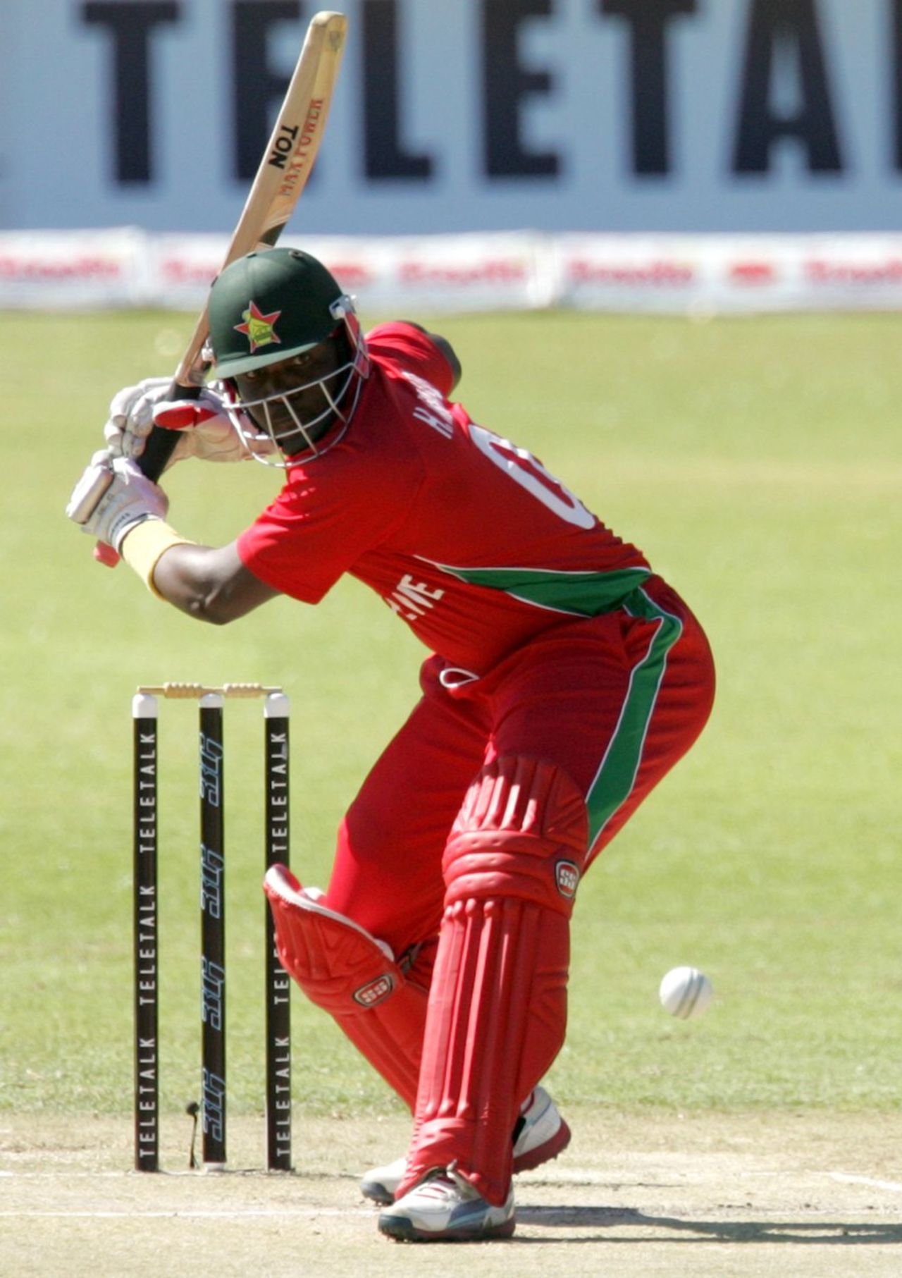 Hamilton Masakadza winds up to hit the ball, Zimbabwe v Bangladesh, 1st T20, Bulawayo, May 11, 2013