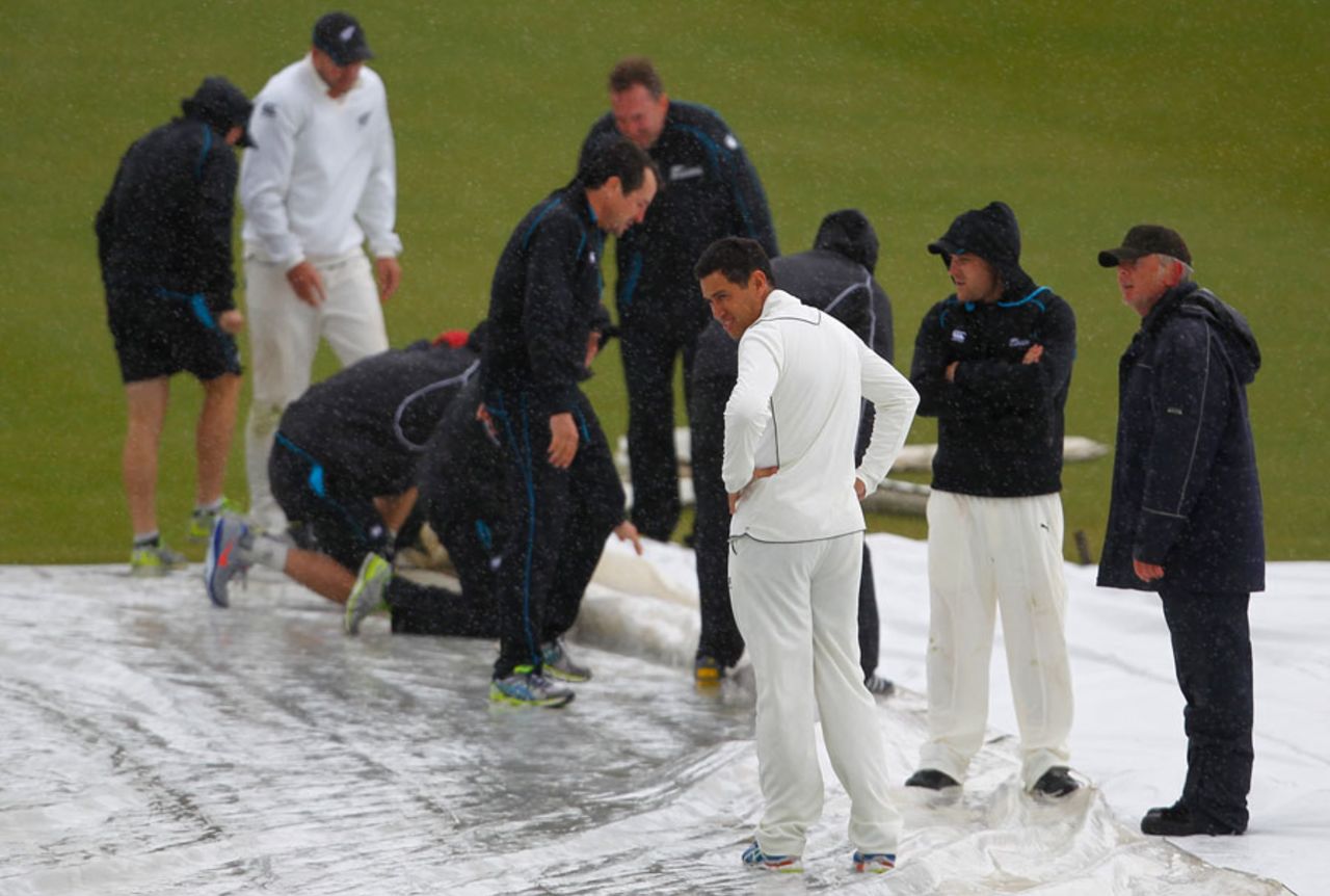 Ross Taylor and Brendon McCullum joined the groundstaff in the middle, England Lions v New Zealanders, Tour match, Grace Road, 3rd day, May 11, 2013
