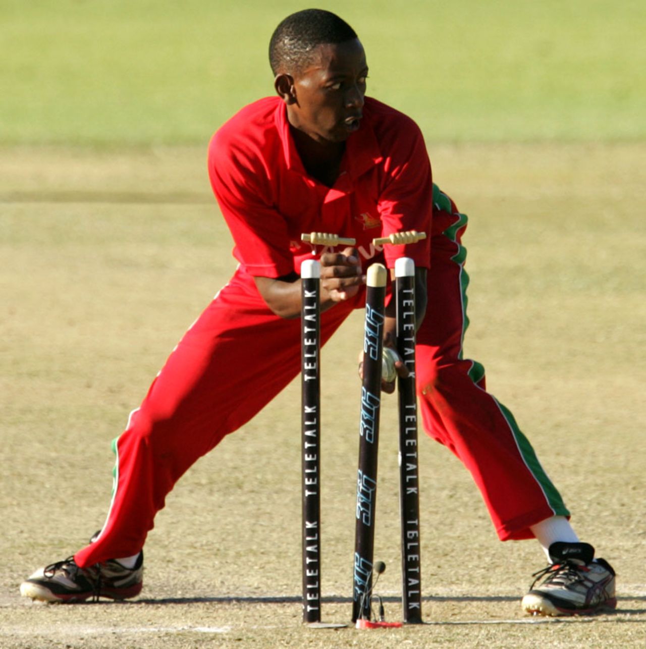 Titotenda Mutombodzi runs out Nasir Hossain, Zimbabwe v Bangladesh, 1st T20, Bulawayo, May 11, 2013