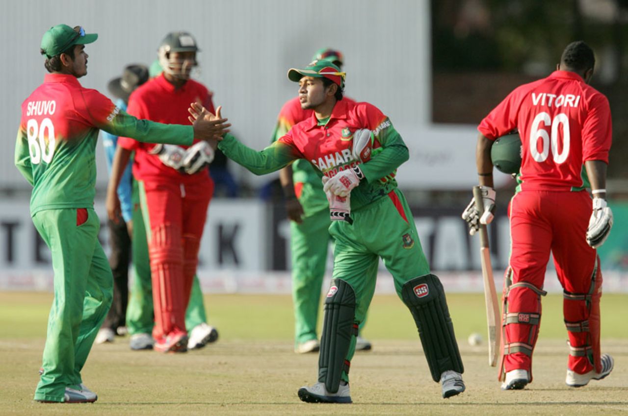 Mushfiqur Rahim congratulates his team-mates after they beat Zimbabwe, Zimbabwe v Bangladesh, 2nd T20I, Bulawayo, May 12, 2013
