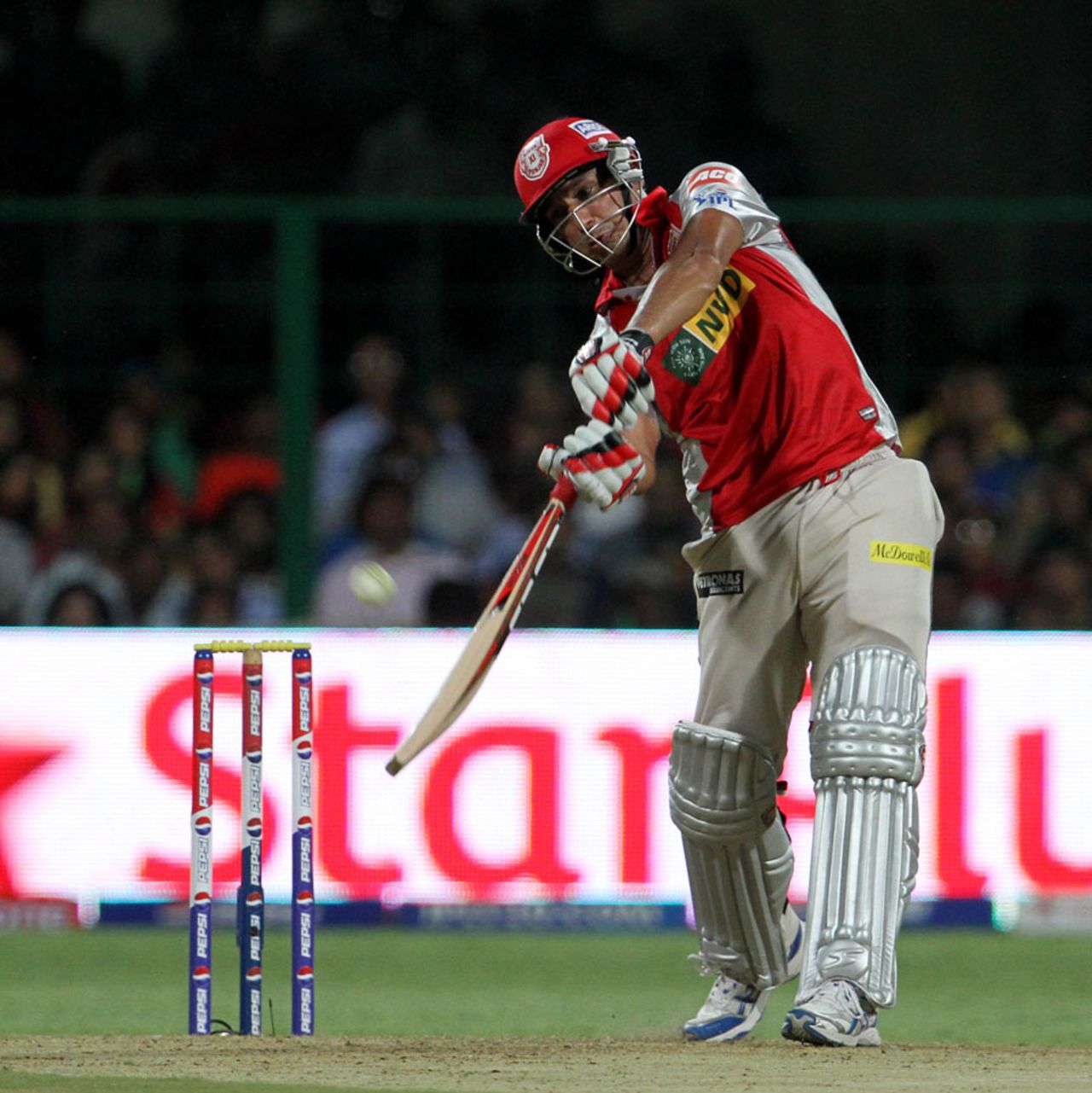 Azhar Mahmood strikes a powerful shot, Royal Challengers Bangalore v Kings XI Punjab, IPL 2013, Bangalore, May 14, 2013