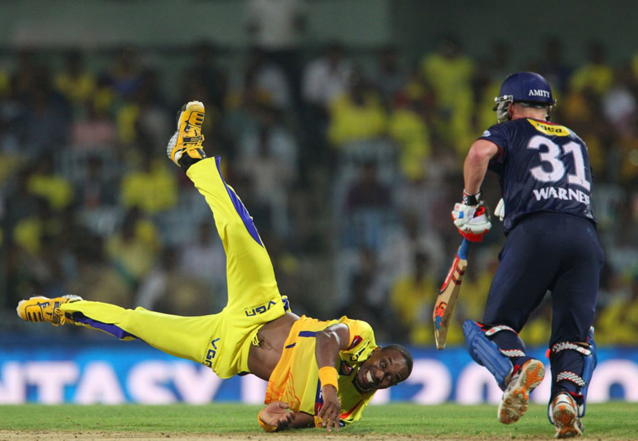 Dwayne Bravo dives to save a run off his bowling, Chennai Super Kings v Delhi Daredevils, IPL 2013, Chennai, May 14, 2013