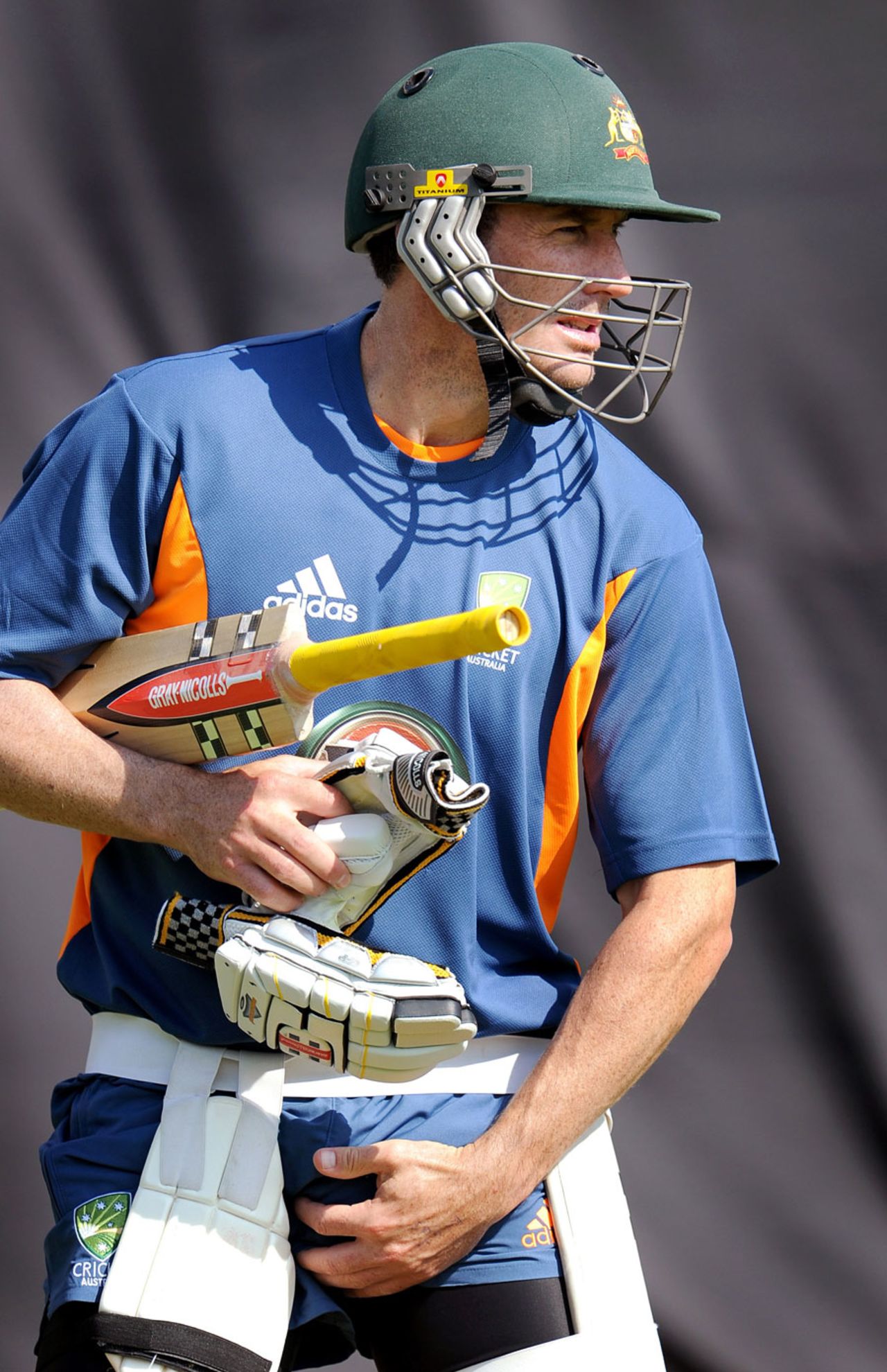 David Hussey adjusts his box during training, Ahmedabad, February 20, 2011